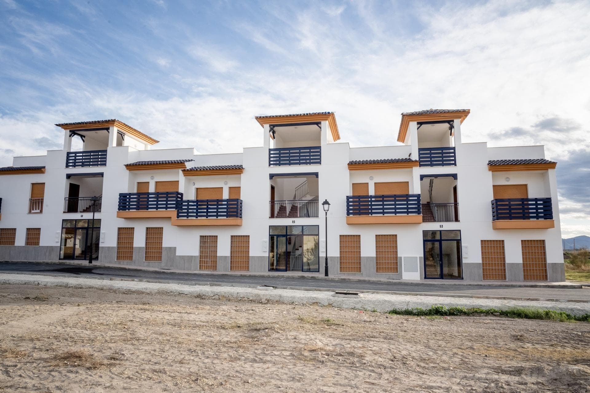 Traditional Two Bedroom Homes in Barrio Herrerias Almeria with Solarium and Community PoolContemporary Living Near the Coast of AlmeriaThis new residential development is located in the peaceful neighborhood of Barrio Herrerias, just 4 km from the beautiful beaches of Villaricos. The area combines a quiet residential atmosphere with the convenience of being close to essential services, local shops and the charming coastal towns of Almeria province. With excellent road connections, residents can enjoy both the tranquillity of inland living and the attractions of the Mediterranean coastline.A Selection of 13 HomesThe development consists of 13 well designed homes featuring 2 bedrooms and 2 bathrooms, one of them ensuite. Buyers can choose between ground floor properties with a private patio or upper floor units with a terrace. Please note that the building does not include a lift, offering a more traditional low rise living style. All homes include a private solarium on the rooftop, ideal for sunbathing, relaxing or enjoying open views of the surroundings.Comfortable Interiors and High Quality FinishesEach property is equipped with a fully furnished kitchen including appliances, pre installation for ducted air conditioning and modern bathroom furniture with mirrors. The exterior carpentry with a wood effect finish and double glazing provides excellent insulation and a warm contemporary aesthetic. Storage needs are covered with a private storeroom and a parking space located in the basement.Community Pool and Relaxed LifestyleResidents can enjoy a communal swimming pool, perfect for cooling off during the warm months and socializing with neighbors. The layout and design of the residential area create a comfortable environment for both permanent living and holiday use.Strategic Distances to Key Points of InterestVillaricos Beach: 4 kmCuevas del Almanzora: 9 kmGolf Courses: 10 to 15 kmMarina of Garrucha: 14 kmAlmeria Airport: 90 kmImmediate Delivery AvailableThese homes are ready to move into, offering a fantastic opportunity for buyers seeking a new build near the Almeria coast.Contact us today to arrange a viewing and secure your new property in Barrio Herrerias.