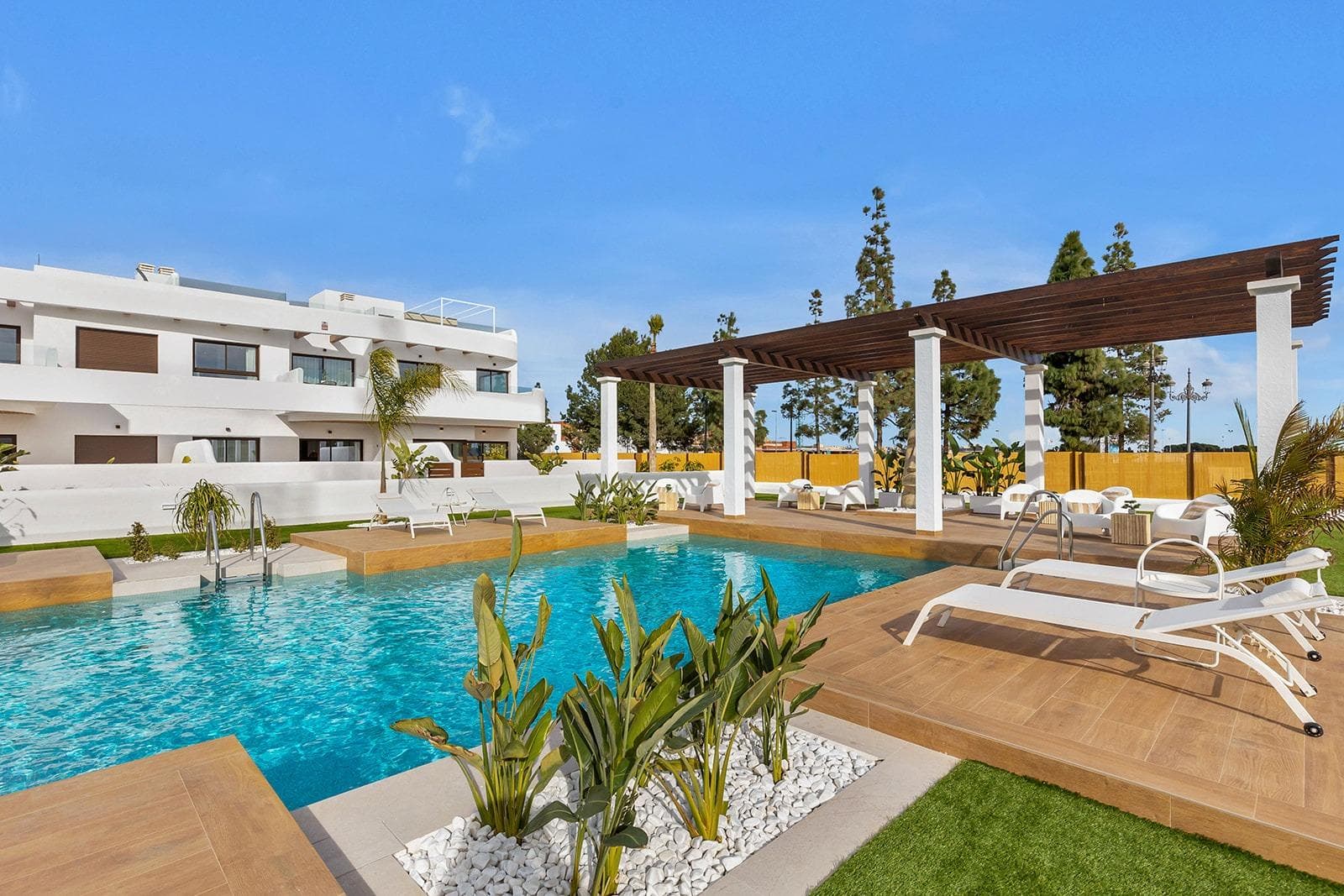 New Build Residential Complex Near Serena Golf and the Mar Menor in Los AlcazaresModern Coastal Living on the Costa CalidaDiscover this attractive new build residential complex located in Los Alcazares, one of the most popular seaside towns on the Costa Calida. Situated just 500 m from the beaches of the Mar Menor and within walking distance of the town center, this development offers an excellent combination of coastal living, golf surroundings and everyday convenience. Los Alcazares is well known for its relaxed atmosphere, long promenades, warm shallow waters and a wide range of restaurants, shops and services open all year round.Contemporary Apartments Designed for ComfortThe development consists of 29 modern homes with 2 or 3 bedrooms, designed with clean architectural lines and high quality finishes. Buyers can choose between ground floor apartments with private garden and terrace, middle floor homes with spacious terraces, or penthouses with private terrace and rooftop solarium offering open views. Many of the properties enjoy views towards Serena Golf and the Mar Menor, creating a calm and pleasant living environment.All homes are designed to maximize natural light and functionality, making them ideal as a permanent residence, holiday home or investment property.High Quality Features and Communal AreasEach property includes a private parking space and a storage room. The specifications are designed to provide comfort and energy efficiency, including double glazed windows with thermal break, pre installation of ducted air conditioning, aerothermal system for domestic hot water, electric shutters in bedrooms and a complete interior and exterior lighting package. Bathrooms are delivered fully equipped with furniture, mirror and shower screen.Residents can enjoy attractive communal areas with landscaped gardens and a communal swimming pool, perfect for relaxing and enjoying the Mediterranean climate. Selected blocks are equipped with lifts for added convenience.Prime Location Between Golf and SeaThis residential complex enjoys a privileged location next to Serena Golf, one of the most renowned golf courses in the area, and just a short walk from the calm waters of the Mar Menor. The area is ideal for swimming, sailing, paddleboarding and other water sports throughout the year.Key distances include Mar Menor beaches at 0.5 km, Serena Golf directly next to the development, Los Alcazares town center at 2 km, Cartagena at 22 km and Murcia city at 40 km. Murcia Corvera Airport is approximately 30 km away and Alicante Airport is around 90 km.An Ideal Home or Investment OpportunityWith its excellent location, modern design and proximity to both golf and the sea, this new residential complex in Los Alcazares offers an outstanding lifestyle opportunity on the Costa Calida. Contact us today to receive more information or to arrange a private viewing and secure your new home by the Mar Menor.