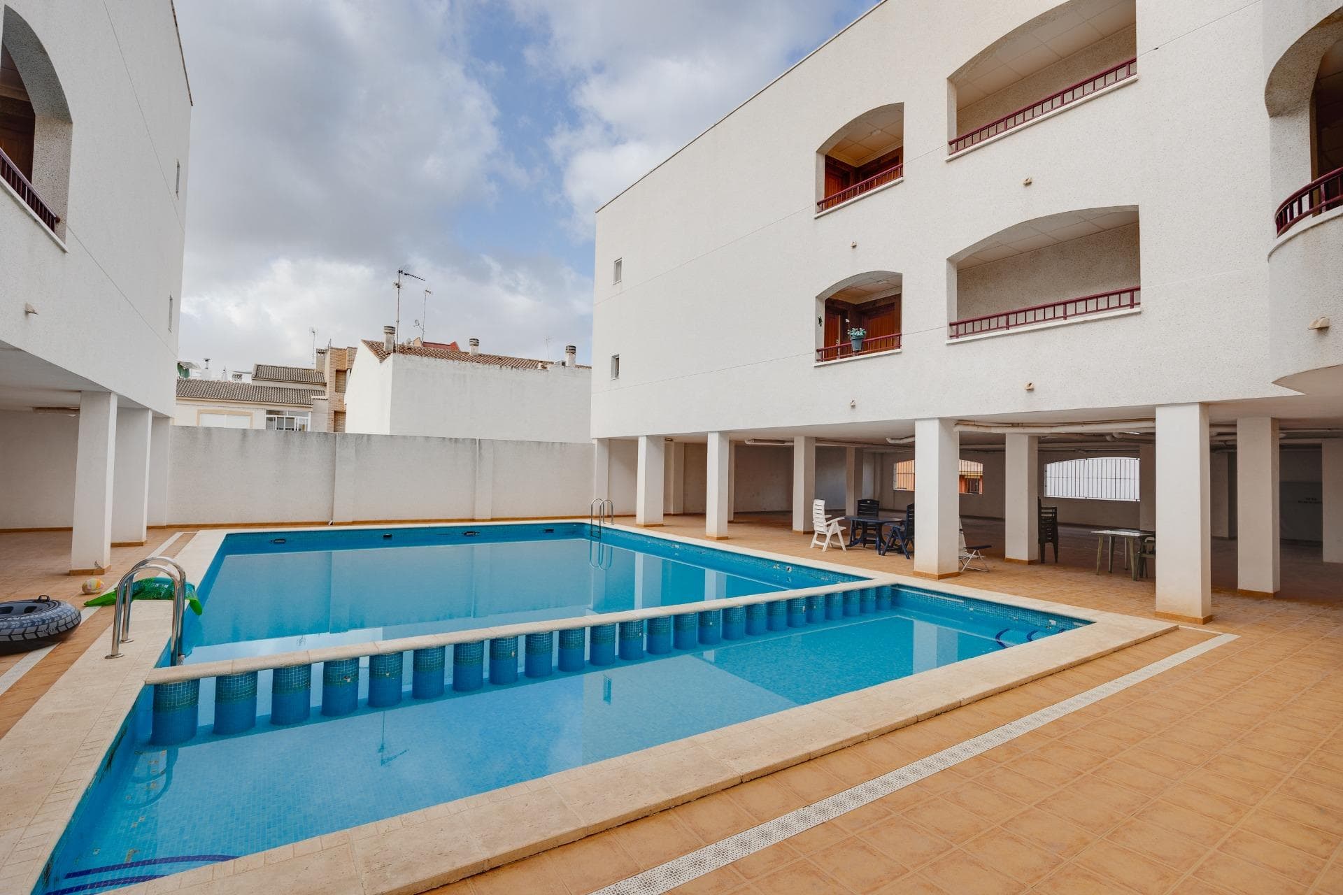 Renovated Apartments in the Center of San FulgencioApartments with Communal Pool in a Central LocationThis regenerated residential development in San Fulgencio Alicante offers a unique opportunity to purchase a fully renovated apartment in a well established Spanish town close to the Costa Blanca beaches. Originally built in 2009 and now completely updated and finished, the project consists of 1, 2 and 3 bedroom apartments distributed over just two floors, creating a low density and private community.Located in the heart of the town, the residential complex is within walking distance of all essential services, making it ideal for permanent living, holiday use or long term rental investment.Functional Layouts with Quality FeaturesThe development offers bright and practical homes designed for comfort and convenience. The building includes a lift and a spacious underground parking garage with optional parking spaces available from 7000 euros.Each apartment is designed to maximize natural light and functionality, with well distributed living spaces suitable for individuals, couples or families looking for an affordable property close to the coast.Communal Pool and Everyday Amenities at Your DoorstepAt the center of the residential complex, residents can enjoy a communal swimming pool, perfect for relaxing during the warm Mediterranean months.San Fulgencio is a traditional Spanish town with a welcoming atmosphere and a wide range of local amenities including a school, local theatre, sports complex, pharmacy, cafes, bars, hardware stores and grocery shops. Larger supermarkets and a broader selection of restaurants are just a 10 minute drive away.Excellent Connections to Beaches and Key DestinationsThe location offers easy access to the coast and major cities in the province.Nearest beach 7 kmTorrevieja 25 kmAlicante city center 45 kmAlicante Airport 30 kmGuardamar del Segura Beach 8 kmLa Marquesa Golf 10 kmThis strategic position allows residents to enjoy peaceful town living while remaining close to beaches, golf courses and transport links.Delivery and Investment OpportunityThe expected completion date is June 2026, offering buyers the opportunity to secure a modernized apartment in a central and well connected location.Contact us today to receive more information and reserve your new home in San Fulgencio before availability runs out.