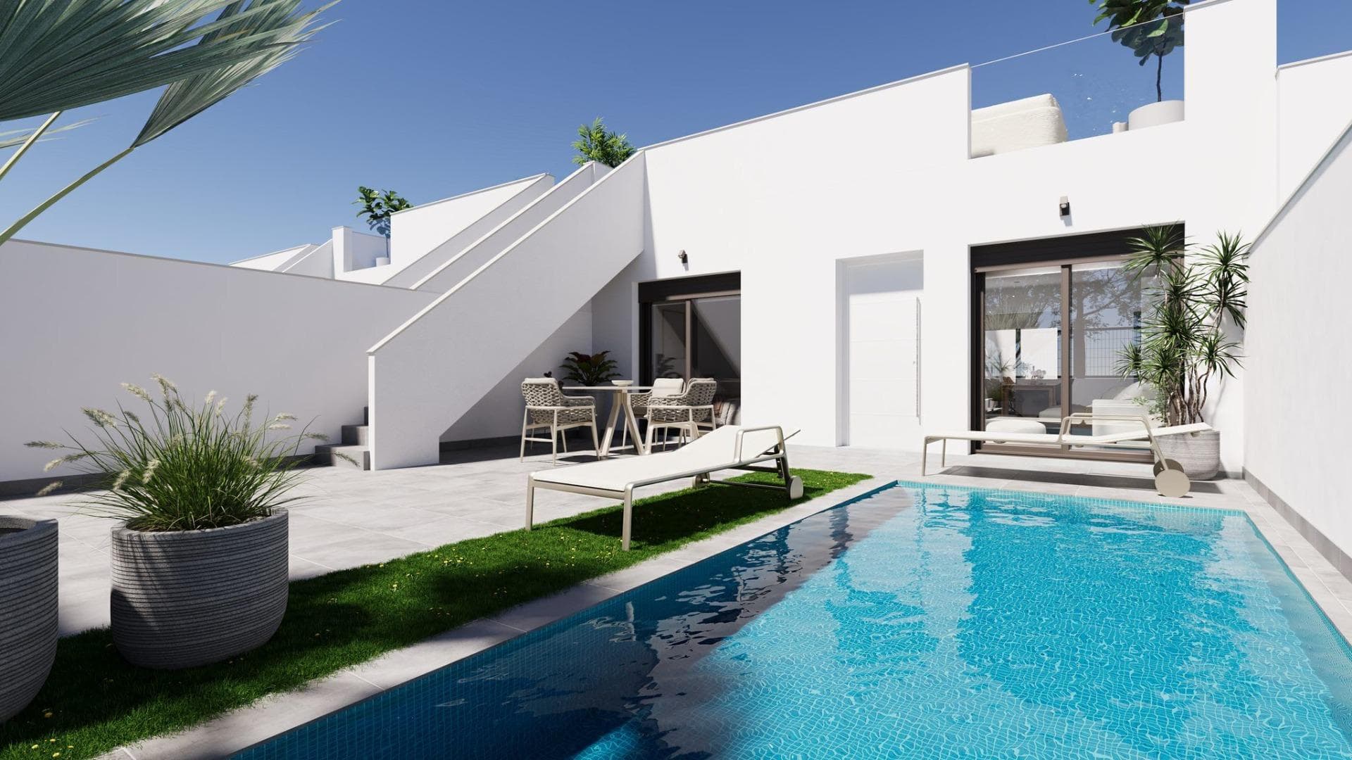 Modern, newly built semi-detached and terraced homes with private pools at El Alba Resort-Torre PachecoContemporary homes in a growing Mediterranean holiday communityThis new development comprises 16 exclusive semi-detached and terraced homes, situated at El Alba Mediterranean Resort in Torre Pacheco. Designed as single-storey homes, these modern properties offer a perfect blend of comfort, functionality and Mediterranean outdoor living.El Alba Resort is an up-and-coming residential area surrounded by open countryside and golf courses, within easy reach of the town of Roldán, where you will find supermarkets, restaurants, banks and everyday amenities. The complex already features a social club with a swimming pool and restaurant, and a retail area is currently under development, adding further convenience and value to the location.Single-storey home with private garden and sun terraceEach property features 2 bedrooms and 2 bathrooms, one of which is en-suite, with an open-plan kitchen connected to a bright living room. The layout is carefully designed to maximise natural light and create a seamless connection between indoor and outdoor spaces.All homes include:Fitted kitchen with appliancesBathrooms with vanity units, mirrors, lighting and shower screensFitted wardrobes with drawers in the bedroomsPre-installation for ducted air conditioningIndoor and outdoor LED lightingThree photovoltaic solar panels with a capacity of 1.5 kW per propertyThe outdoor areas are designed to be enjoyed all year round, featuring a private garden with a swimming pool, a terrace and a large private sun deck with a summer kitchen, ideal for al fresco dining and relaxing in the sun.Quality features designed for comfort and efficiencyThese homes are built with stylish and functional interiors, focused on energy efficiency and modern living. The plot features a private parking space, ensuring convenience and security.The combination of solar panels, high-quality insulation and smart design provides an energy-efficient home, ideal for permanent living, holiday use or as a rental investment.Excellent location near golf courses, beaches and airportsRoldán town centre 2 km awayMar Menor beaches 15 km awayMediterranean beaches 20 km awayLa Torre Golf Resort 5 km awayTerrazas de la Torre Golf 6 km awayMurcia Corvera Airport 18 km awayCartagena 30 km awayThis strategic location offers easy access to golf courses, beaches, amenities and transport links, whilst enjoying a peaceful residential setting.A smart investment on the Costa CálidaThese townhouses and semi-detached homes at El Alba Mediterranean Resort offer an excellent opportunity to purchase a modern property with a private pool in the rapidly growing area of Torre Pacheco.Contact us today for further information or to arrange a viewing of these exclusive new-build homes.