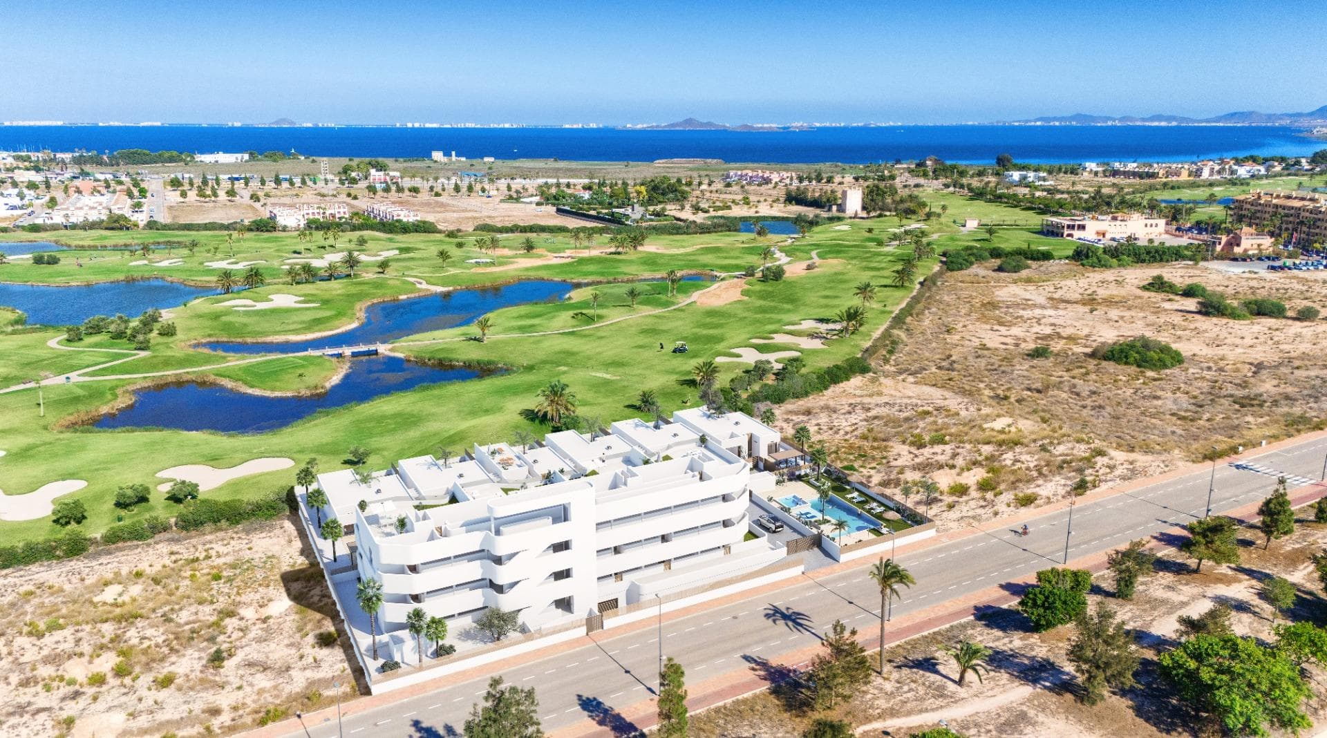 New Build Apartments and Villas Frontline Golf in Los Alcazares Costa CalidaExclusive Residential Development Near the Beach and GolfDiscover this exceptional new build residential complex in Los Alcazares, one of the most desirable coastal towns on the Costa Calida. Ideally located just 1.2 km from the beaches of the Mar Menor and frontline to La Serena Golf, this development offers a perfect blend of modern living, coastal lifestyle and peaceful golf surroundings.Los Alcazares is a charming seaside town known for its relaxed atmosphere, long promenade, local restaurants and year round services, making it ideal for both permanent living and holiday homes.Modern Apartments and Exclusive VillasThe development consists of 37 contemporary apartments distributed across three low rise buildings, designed around a beautiful communal pool and landscaped gardens. Buyers can choose between 2, 3 or 4 bedroom apartments, including ground floor units with terraces, middle floor apartments and penthouses with private solariums offering open views to the golf course and the sea.In addition, the project includes 7 exclusive single level villas with 3 bedrooms, each featuring a private pool and a prime frontline golf position.High Quality Features and ComfortAll properties are built with modern finishes and designed for comfort and functionality. Each home includes fully equipped bathrooms with furniture and shower screens, pre installation for ducted air conditioning and motorized shutters in bedrooms.Apartments also benefit from a private parking space and storage room in the underground garage, accessible by lift, ensuring convenience and security.Prime Location in Los AlcazaresThis residential complex enjoys a strategic location with easy access to all amenities, golf courses and major road connections. The town center is within walking distance, offering supermarkets, shops, restaurants and leisure facilities.The Mar Menor is known for its calm and warm waters, perfect for swimming, sailing and water sports, while La Serena Golf is highly regarded for its unique design with water features throughout the course.Distances to Key Points of InterestMar Menor beaches 1.2 kmLa Serena Golf adjacentRoda Golf 4 kmCartagena 20 kmMurcia International Airport 35 kmAlicante Airport 95 kmYour Ideal Home on the Costa CalidaWhether you are looking for a permanent residence, a holiday retreat or a smart investment, this development offers an unbeatable combination of location, quality and lifestyle. Contact us today to receive more information or arrange a visit and secure your new home in Los Alcazares.
