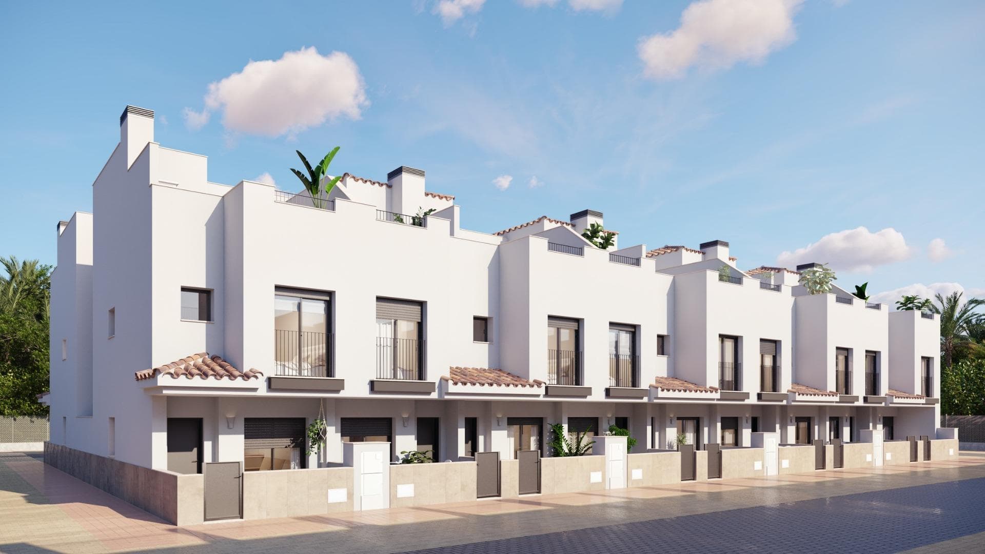 Modern Townhouses Near Golf Courses in Santa Rosalia-MurciaNew Build Homes in a Peaceful Village SettingDiscover this attractive new development of contemporary townhouses located in the charming village of Santa Rosalia in the Region of Murcia. Surrounded by some of the most prestigious golf courses in the area and just a short drive from the beaches of the Mar Menor, this location offers the perfect combination of tranquility, convenience and outdoor lifestyle.Santa Rosalia is a traditional Spanish village with a welcoming atmosphere, where residents can enjoy local shops, a supermarket, bars and restaurants including the popular La Almazara. Its strategic position between Roda Golf, Mar Menor Golf and Los Alcazares makes it highly desirable for both permanent living and holiday homes.Stylish Townhouses with Solarium and Outdoor LivingThe development consists of 18 modern townhouses with 2 or 3 bedrooms and 2 bathrooms, designed with a contemporary open plan layout. Each home features a bright living and dining area connected to a fully fitted kitchen with appliances, creating a functional and comfortable living space.All properties include a private rooftop solarium with a summer kitchen, ideal for enjoying the Mediterranean climate, entertaining guests or relaxing outdoors throughout the year. In addition, each home benefits from a private parking space and a storage room located in a communal garage.Quality Finishes and Modern FeaturesThese homes are built with high quality materials and designed to offer comfort and energy efficiency. Features include an aerothermal system for hot water, pre installation for ducted air conditioning, and fully equipped bathrooms with furniture, mirrors and shower screens.The development also includes a communal swimming pool, providing a perfect space to relax and enjoy sunny days in a peaceful environment.Prime Location Close to Golf and the SeaSanta Rosalia is ideally located just 4.5 km from the beaches of Los Alcazares, known for their calm waters and long promenade along the Mar Menor. The surrounding area is a paradise for golf lovers, with several top courses just minutes away.The nearby town of Los Alcazares offers a wide range of services, restaurants, shops and leisure activities, making daily life easy and enjoyable.Distances to Key Points of InterestLos Alcazares beaches 4.5 kmRoda Golf 3 kmMar Menor Golf 4 kmCartagena 25 kmMurcia International Airport 30 kmYour Ideal Home on the Costa CalidaThis development offers an excellent opportunity to own a modern townhouse in a well connected and peaceful location near golf courses and the sea. Contact us today to receive more information or arrange a visit and secure your new home in Santa Rosalia.