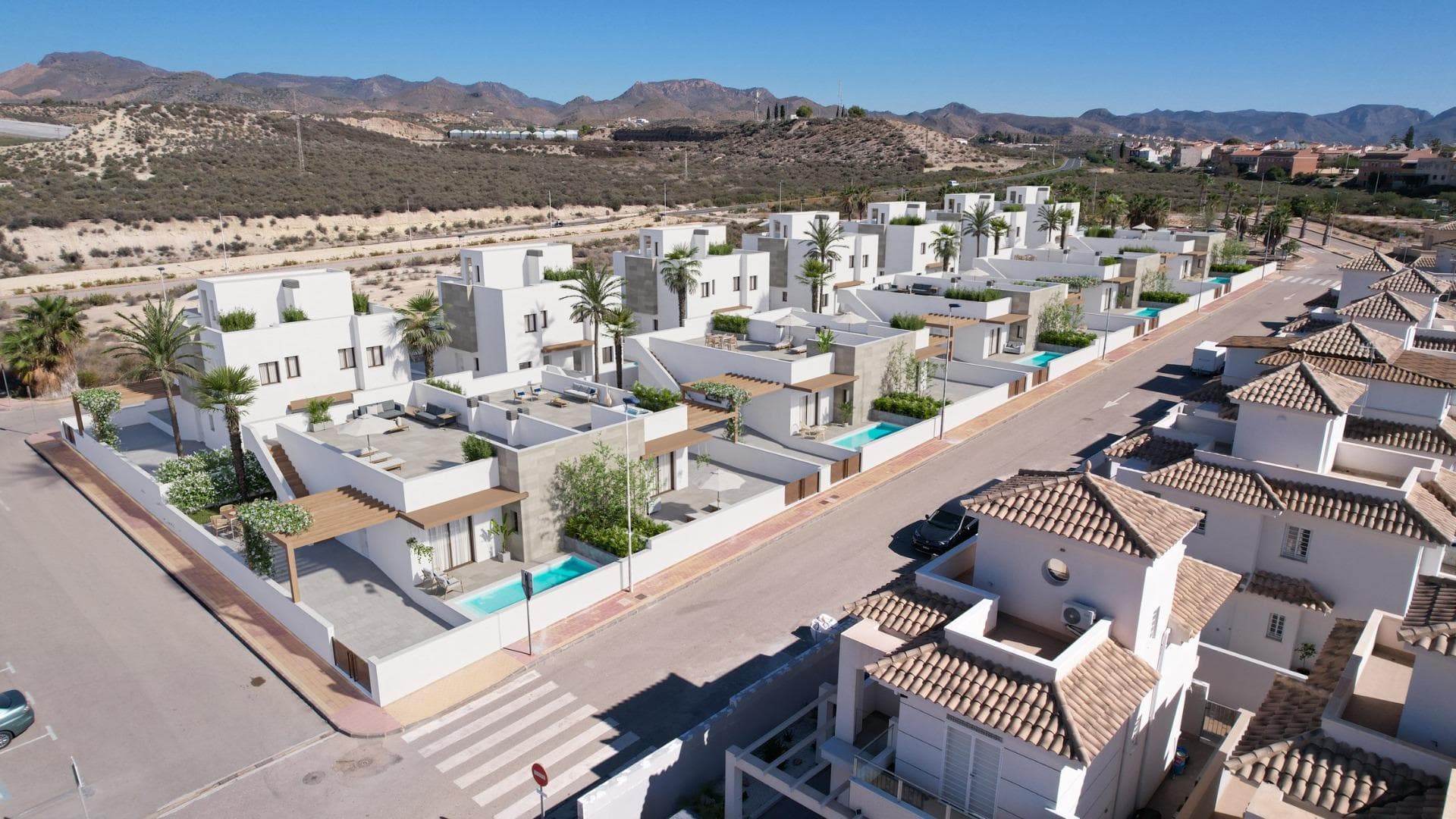 New Build Semi Detached Villas in Puerto de Mazarrón Close to the BeachContemporary Mediterranean Villas in Puerto de MazarrónDiscover this exclusive development of 12 new build semi detached villas located in the sought after residential area of Los Caleñares in Puerto de Mazarrón, Murcia. Positioned in a quiet yet central location, these modern homes are just 950 meters from the beach and within walking distance of all essential services, making them ideal as a permanent residence, holiday home or investment property on the Costa Cálida.Puerto de Mazarrón is one of the most attractive coastal destinations in the Region of Murcia, known for its beautiful sandy beaches, crystal clear waters, charming marina and relaxed Mediterranean atmosphere. The area offers excellent restaurants, beach bars, shopping facilities and outdoor activities throughout the year thanks to its mild climate.Functional Single Level Design with Private Outdoor SpacesThese stylish villas are built on one level and offer a comfortable and practical layout designed to maximize natural light and everyday living. Each property features 88 m2 of built area distributed into a spacious open plan living and dining room with preinstallation for an American style kitchen, pantry, 3 double bedrooms with fitted wardrobes and 2 fully equipped bathrooms.Large sliding doors connect the interior living area with the outdoor terrace and private garden, creating a seamless indoor outdoor lifestyle ideal for enjoying the Mediterranean climate. Every villa also includes a private rooftop solarium, perfect for sunbathing, relaxing or creating an outdoor entertainment space with open views of the surrounding area.The generous corner plots include private gardens, patio areas and off road parking within the plot. Buyers also have the option to add a private swimming pool for an additional cost.High Quality Specifications and Modern ComfortThese homes have been designed with quality materials and contemporary finishes throughout. Features include porcelain stoneware flooring, white lacquered interior carpentry, double glazed aluminum windows with thermal break technology and electric shutters in the bedrooms.Additional specifications include:Reinforced security entrance doorPre installation for ducted air conditioningAerothermal system for hot water productionBathrooms with vanity units, mirrors and shower screensThermal and acoustic insulation for improved comfort and energy efficiencyExcellent Location Near Beaches and ServicesThe development enjoys an excellent location close to supermarkets, shopping centers, schools, parks, medical services and public transport. Puerto de Mazarrón offers an authentic Spanish coastal lifestyle combined with modern conveniences and excellent road connections.Distances to Main Points of InterestPuerto de Mazarrón Beach: 0.95 kmMazarrón Marina: 2 kmIsla Plana: 7 kmCamposol Golf: 18 kmCartagena city center: 35 kmMurcia International Airport: 40 kmAlicante Airport: 125 kmYour New Home on the Costa CálidaEnjoy modern living, sunshine and Mediterranean charm in one of the most desirable coastal areas of Murcia. Contact us today for more information or to arrange a visit to these exclusive new build semidetached villas in Puerto de Mazarrón.