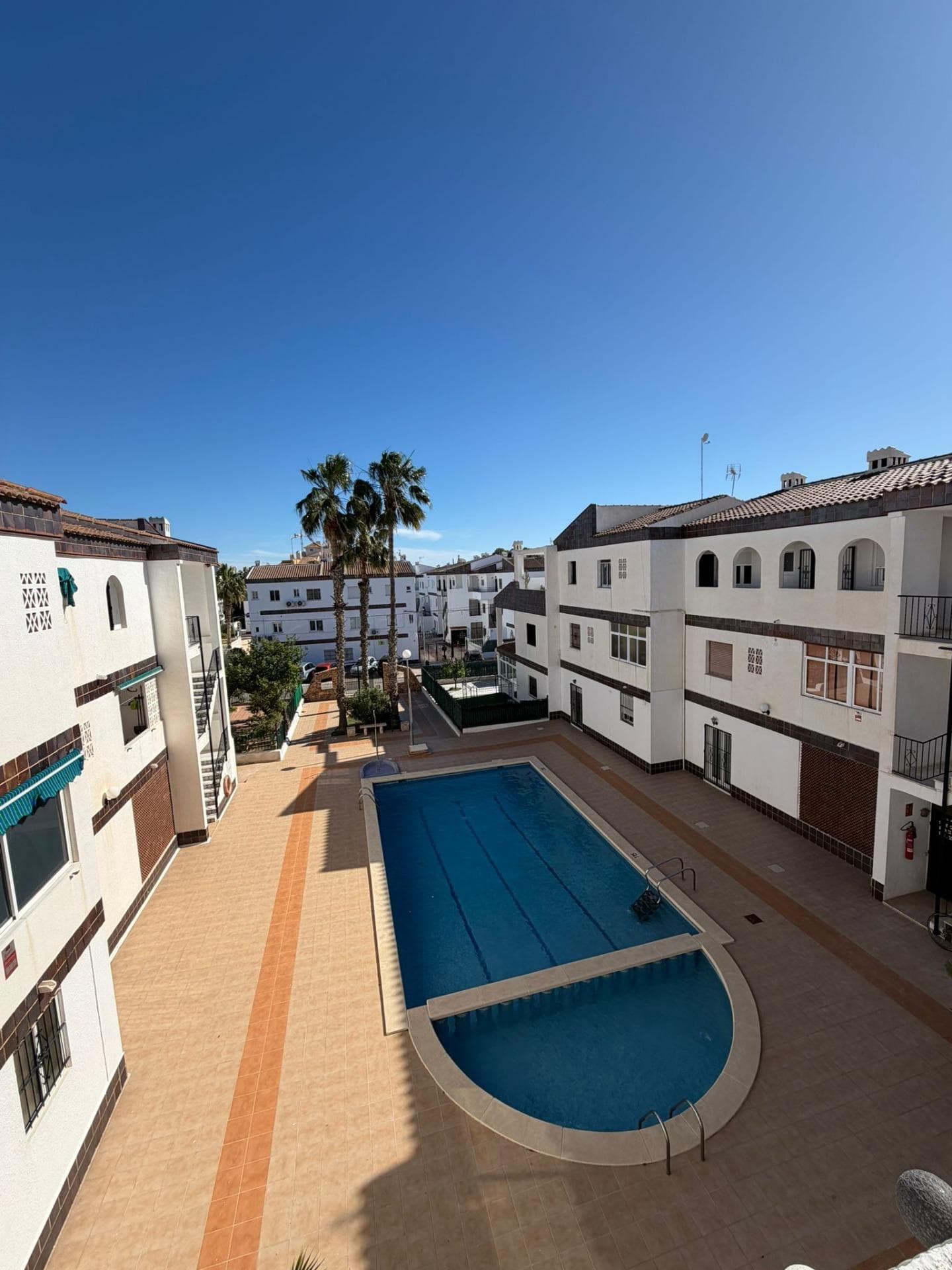 For sale: a fully renovated apartment located in the popular Cala Dorada I urbanisation in Punta Prima. The property is situated on the second floor and offers comfortable living conditions, ideal both as a permanent residence and as a rental investment. The apartment has been completely refurbished – including new air conditioning, kitchen, windows, doors, bathroom, and flooring. Thanks to this, the property is ready to move into with no additional investment required. The layout includes two bedrooms, a bright living room with access to a balcony, a kitchen, and a bathroom. The balcony is a perfect place to relax and enjoy the Mediterranean climate. An additional advantage is a storage/utility room, providing practical extra space. The location is a major highlight – a quiet and well-maintained urbanisation, yet close to all amenities. Nearby you will find restaurants, shops, and leisure areas. Rocío del Mar beach is approximately 1 km away. This is a great opportunity for those looking for a ready-to-move-in property in a good location on the Costa Blanca. Key features Type: Apartment Bedrooms: 2 Floor: 2nd Condition: Fully renovated Air conditioning: New Balcony: Yes Storage room: Yes Urbanisation: Cala Dorada I – Punta Prima Distance to beach: approx. 700m Price: €169,000 Why it’s worth it – Fully renovated – Ready to move in – Balcony + storage room – Great location close to amenities – 1 km to the beach