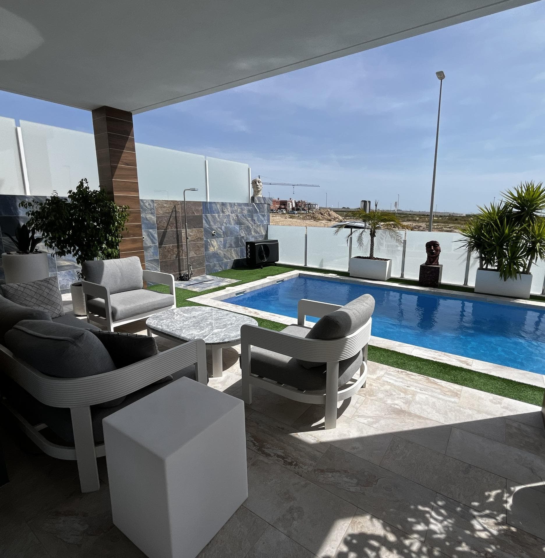 Luxury detached villa in Vistabella Golf Resort with open views over nature, the Pink Lagoon and the horizon of the Mediterranean Sea. An exceptional property on the Costa Blanca combining contemporary elegance, advanced technology and the comfort of a home designed to be enjoyed every day. Set in an elevated position, the villa offers a sense of peace, security and privacy thanks to its corner location. The residential area benefits from controlled access with a security checkpoint and electronic vehicle registration, an added value that enhances exclusivity. Just five minutes away is the prestigious 18-hole Vistabella Golf course, one of the most sought-after and highly regarded in the area. All essential amenities are also nearby, including supermarket, pharmacy, restaurants, cafés and shops. The property features 3 spacious bedrooms and 3 bathrooms, two of them en suite with dressing rooms. On the ground floor there is a large living-dining area, open-plan kitchen, utility room, and 2 bedrooms – one en suite with dressing room and another with fitted wardrobe. Upstairs you will find a spectacular 20 m² master bedroom filled with natural light through large windows, with an elegant private bathroom, dressing room and exclusive terrace where you can enjoy open sunrises and unforgettable sunsets. Every detail has been carefully considered: underfloor heating in the bathrooms, windows in all bathrooms, electric shutters, installed curtains and a large automated awning with wind sensor, designed to provide comfort and protection effortlessly. On the upper terrace, a fully equipped outdoor kitchen invites you to enjoy long open-air meals, complemented by a barbecue area where every gathering becomes a special occasion. The private 4.50 x 7.50 metre swimming pool, with automatic salt system, Redox control equipment for total pool management, automatic water refill and heating/cooling system, allows year-round swimming, even at 30 degrees, transforming the outdoor space into a true private oasis. The property also includes a special drinking water filtration system for the entire house, solar panels with inverter, battery storage and grid injection, reflecting a clear commitment to efficiency and sustainability. The private parking area has space for 3 vehicles and access through an automatic gate with remote control. Jacuzzi, furniture and other extras are available optionally by negotiation. Come and discover a magical home where light, views and quality come together to create an exclusive lifestyle.