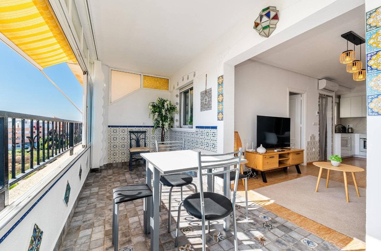 Discover this charming penthouse in Playa Flamenca, a home designed to enjoy the authentic Mediterranean lifestyle with an Andalusian touch all year round. Located in the well-known La Mirada residential complex, in one of the most sought-after areas of Orihuela Costa, this property combines comfort, privacy, and exceptional outdoor spaces, making it an ideal opportunity both for living and investing on the Southern Costa Blanca. From the very first moment, the property conveys a warm and bright atmosphere thanks to its excellent layout and the pleasant flow of natural light throughout the home. The apartment features 2 bedrooms, 1 fully equipped bathroom with a walk-in shower, a spacious living and dining area, and a fully equipped open-plan kitchen with appliances included, designed to provide functionality and comfort for everyday living. In addition, it offers a practical laundry area and a pleasant terrace, perfect for outdoor breakfasts or relaxing moments. However, the true highlight of this property is its spectacular 63 m² private roof top solarium. A unique space where every day becomes a special experience. Thanks to its stunning open views of the Mediterranean Sea and its intimate and sunny atmosphere, this corner invites you to enjoy unforgettable gatherings with friends and family, relaxing afternoons under the pergola, or outdoor dinners in the BBQ area while watching the sunset over the coast. A true private oasis where you can disconnect and fully enjoy the privileged climate of the area. The residential complex also offers a large communal swimming pool surrounded by well-maintained communal areas, as well as an underground parking space of approximately 12 m², providing extra comfort and security. The location is simply excellent. Surrounded by supermarkets, restaurants, cafés, and all services open throughout the year, the apartment is just a few minutes from Zenia Boulevard shopping centre and perfectly connected to Torrevieja and the AP-7 motorway.        The famous beaches of Playa Flamenca and Orihuela Costa are only a few minutes away, making this property an ideal option both for holidays and permanent living. Thanks to the high demand in the area, this property also represents an excellent investment opportunity. A charming home full of sunshine, privacy, and sea views, designed to enjoy the very best moments of life on the Costa Blanca.