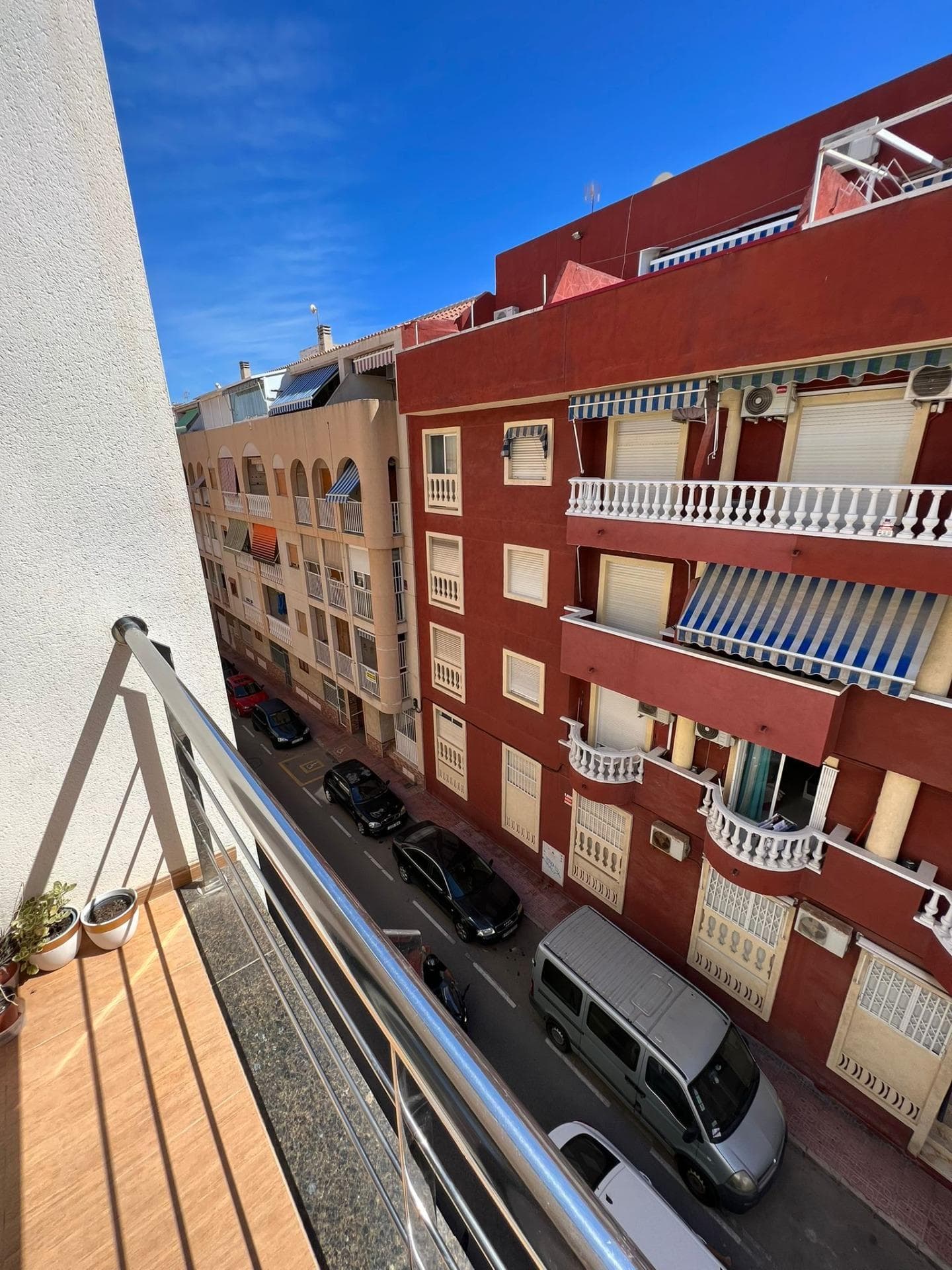 Discover this elegant and spacious apartment located in one of the most sought-after areas of Torrevieja, just 150 meters from the famous Playa de Los Locos, a privileged location where you can enjoy the authentic Mediterranean lifestyle all year round. The property offers 91 m² of built area, carefully distributed to provide comfort, functionality, and plenty of natural light. It features 3 spacious bedrooms and 2 fully equipped bathrooms, one of them en suite with a bathtub, ideal for greater privacy and comfort. The heart of the property is its modern and bright living-dining area with direct access to the balcony, perfect for relaxing, enjoying breakfast outdoors, or taking advantage of the wonderful Costa Blanca climate. The open-plan kitchen is fully equipped with appliances and features a large wooden island, creating a warm and contemporary atmosphere ideal for both everyday living and entertaining family and friends. The other two bedrooms share a second full bathroom with a shower, providing comfort for guests or larger families. The apartment is sold fully furnished and equipped, ready to move into, excluding only the owner’s personal belongings and decoration. It also includes air conditioning, and the building has a lift, ensuring everyday comfort and accessibility. Its location is undoubtedly one of its greatest advantages. Within walking distance, you will find supermarkets, international restaurants, cafés, pharmacies, shops, public transport, and the beautiful promenade of Torrevieja, perfect for walks by the sea and enjoying stunning Mediterranean sunsets. Thanks to its exceptional location close to the beach and all amenities, this property represents an excellent opportunity both as a permanent residence, a holiday home by the sea, or an investment with high rental potential in one of the most desirable areas of Torrevieja among international buyers. Torrevieja is one of the most popular destinations on the Costa Blanca, known for its privileged climate with more than 300 days of sunshine per year, beautiful sandy beaches, international atmosphere, and excellent connection to Alicante Airport. Do not miss this fantastic opportunity to own a property near the sea in Spain. Contact us today for more information or to arrange a private viewing.