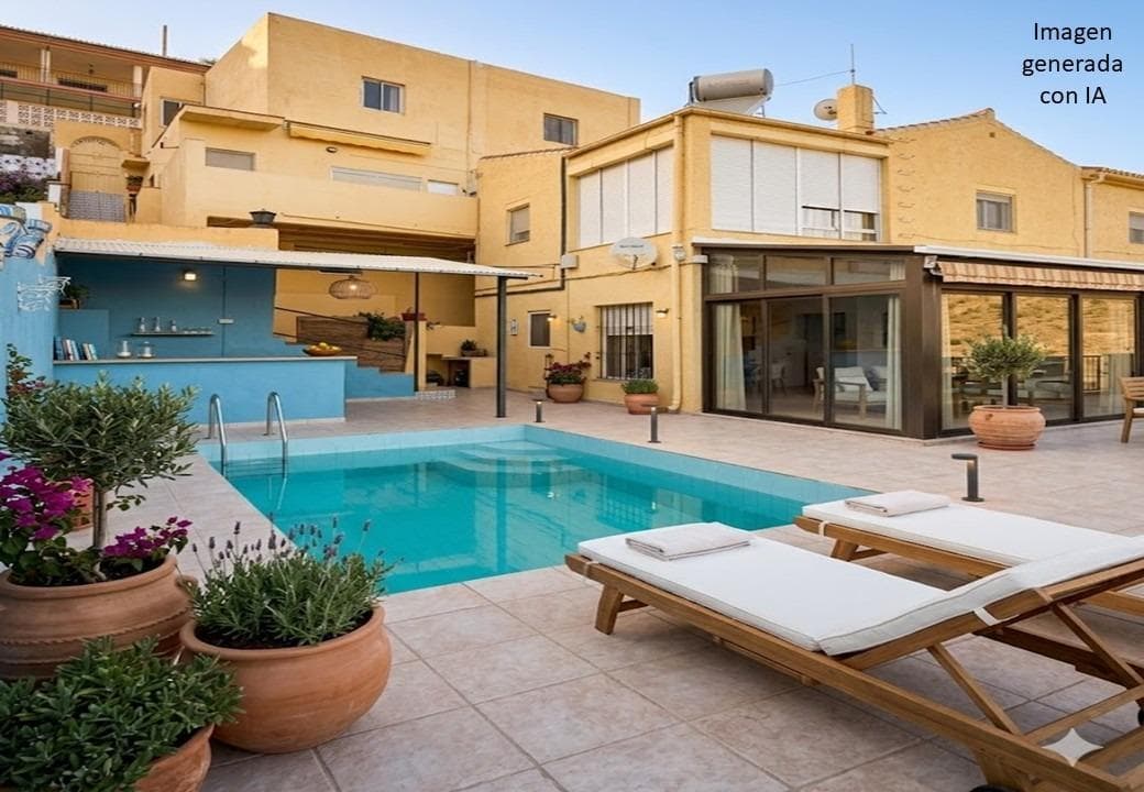 There are properties that stand out for their square meters, their finishes or their location. And then there are those that offer something much more difficult to find: a way of living. Nestled on the slopes of the Almuñécar mountain range, within the prestigious Rancho Río Verde urbanization, this extraordinary villa enjoys a privileged position that makes it a real private balcony over the Mediterranean. From its terraces and gardens, the views unlimited unlimited over the Bay of La Herradura, the Almuñécar coast and the infinite blue of the sea, creating a stage that changes color with each hour of the day. The property has been conceived to enjoy light, privacy and landscape. Distributed in two independent houses, it brings together spaciousness, versatility and enormous potential both as a family residence and to receive guests or develop an attractive accommodation project. The main house has four bedrooms, two bathrooms, a separate kitchen and a cozy living room with a fireplace that invites you to enjoy the quietest afternoons of the year. The large glazed terrace acts as a natural extension of the house, a privileged space from which to contemplate the horizon in any season. Outside, large patios, gardens and a private pool are harmoniously integrated with the surroundings, while a charming orchard brings that authentic and serene character that today represents true luxury. As a perfect complement, the villa has a completely independent apartment with two bedrooms, full bathroom, French kitchen, a spacious living room and a magnificent terrace facing the sea. An ideal space for guests, family members or those looking to combine privacy and hospitality. The property is completed with a large closed garage with capacity for three vehicles with a practical workshop. The garage is located at the top of the farm with convenient access from the road. The most exceptional thing, however, is the feeling of being away from everything without giving up anything. Just eight minutes from the center of Almuñécar and ten minutes from the beaches of La Herradura, the villa offers the perfect combination of exclusivity, nature and proximity to all services. A privileged refuge where each sunrise opens over the Mediterranean and every sunset remembers why some places are simply exclusive. NOTE: The photos that appear in the ad have mostly been retouched with AI programs and are not fully adjusted to reality. The indicated PVP does not include taxes or writing expenses. The surfaces expressed on this page are descriptive in nature and are approximate, so they have no contractual or binding value. Prices may be subject to change without notice. The real estate service delivery fees are not included in the sale price indicated in the advertisement, which amounts to 2.5% more than the PVP. published.