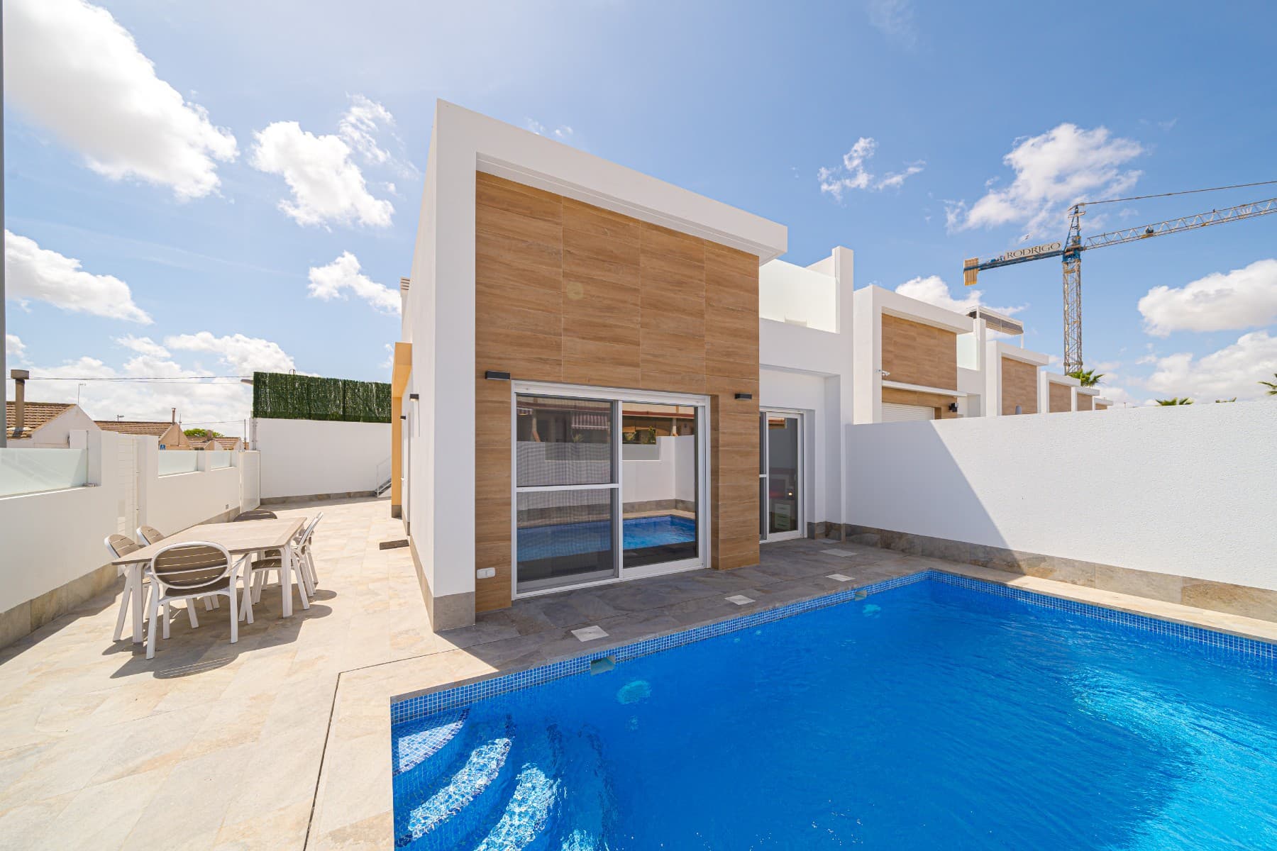 This modern detached villa is situated on a corner plot in the Avileses area. The property is on one level and features a rooftop solarium.This impressive single-storey detached villa is situated on a substantial corner plot in the delightful village of Avileses. The property has been designed with modern living in mind. It features a rooftop solarium spanning 76m², which is the perfect spot to relax, entertain guests or soak up the Spanish sunshine.The property features an open-plan living space, incorporating a lounge and dining area, as well as a fully equipped kitchen. This area is illuminated by glass sliding doors that provide direct access to the garden, allowing an abundance of natural light to illuminate the interior. Outside, guests can enjoy their own private 20-square-metre pool and landscaped surroundings.The master bedroom features an elegant en-suite shower room, while two additional double bedrooms share a tasteful shower room. All bedrooms feature fitted wardrobes and glass sliding doors that open to the garden, creating a seamless indoor-outdoor lifestyle.An external staircase leads to the expansive rooftop solarium, offering panoramic views and a private retreat above.This property is ideally suited to a variety of uses, including as a permanent home, holiday residence, or investment opportunity. It boasts a combination of style, comfort, and a prime location.Avileses is a small village with amenities including a small supermarket, a bakers, a chemist, a doctor's surgery, bars and a couple of restaurants. Hacienda Riquelme Golf Resort and the villages of Sucina and Balsicas are within a 10-minute driving distance, offering a selection of shops, bars, restaurants and amenities. The town is well connected by rail, with links to Murcia, Cartagena and Madrid. The journey time from Murcia Airport to the site is approximately 30 minutes, whereas Alicante Airport is approximately 1 hour away.