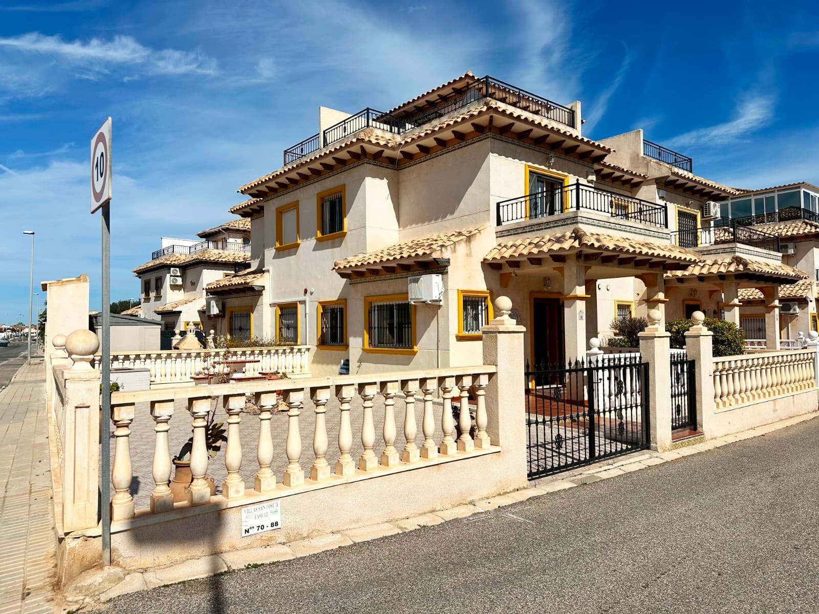 This beautiful two-bedroom, two-bathroom villa is ideally located in the highly desirable area of Cabo Roig, offering a perfect combination of comfort, style, and Mediterranean lifestyle. Set within a well-maintained community, the property enjoys a peaceful setting while being within easy walking distance of local amenities, making it an excellent choice for both permanent living and holiday use.The villa benefits from a generous private garden area and a front-facing sun terrace, ideal for outdoor dining, relaxing, and entertaining. These outdoor spaces provide the perfect environment to enjoy the region’s year-round sunshine. A standout feature of the property is the impressive roof solarium, designed as a true suntrap. This generous space is perfect for sunbathing, hosting guests, or simply unwinding while enjoying the spanish way of life.Upon entering the property, you are welcomed into a bright and spacious lounge and dining area, designed to maximise natural light and comfort. The room is finished with beautiful tiled flooring throughout, enhancing the sense of space while providing practicality and ease of maintenance. The open and airy layout creates a welcoming atmosphere, ideal for both relaxing and socialising.The fully fitted kitchen is offering both functionality and a convenient breakfast bar. The kitchen provides ample storage and workspace, making it ideal for everyday cooking and entertaining alike.The upper level of the property houses two spacious bedrooms, the master bedroom benefiting from their own private sun balcony, allowing plenty of natural light and pleasant outdoor space. The master bedroom is equipped with air-conditioning, ensuring comfort throughout the warmer months. A family bathroom is also located on this level, finished to a good standard and conveniently positioned to serve both bedrooms.Residents of the community enjoy access to a well-maintained communal swimming pool, perfect for cooling off during the summer and relaxing in a tranquil environment. The property is ideally situated within a short walking distance of a variety of bars, restaurants, and local services, offering convenience without the need for a car.The location is particularly attractive, with beautiful beaches just a five-minute drive away, several renowned golf resorts close by, and excellent transport links. Alicante and Murcia airports can both be reached in approximately fifty minutes, making the property easily accessible for both residents and visiting guests.This charming villa offers an excellent opportunity to enjoy coastal living in one of the Costa Blanca’s most sought-after areas, whether as a permanent residence, holiday home, or investment property.