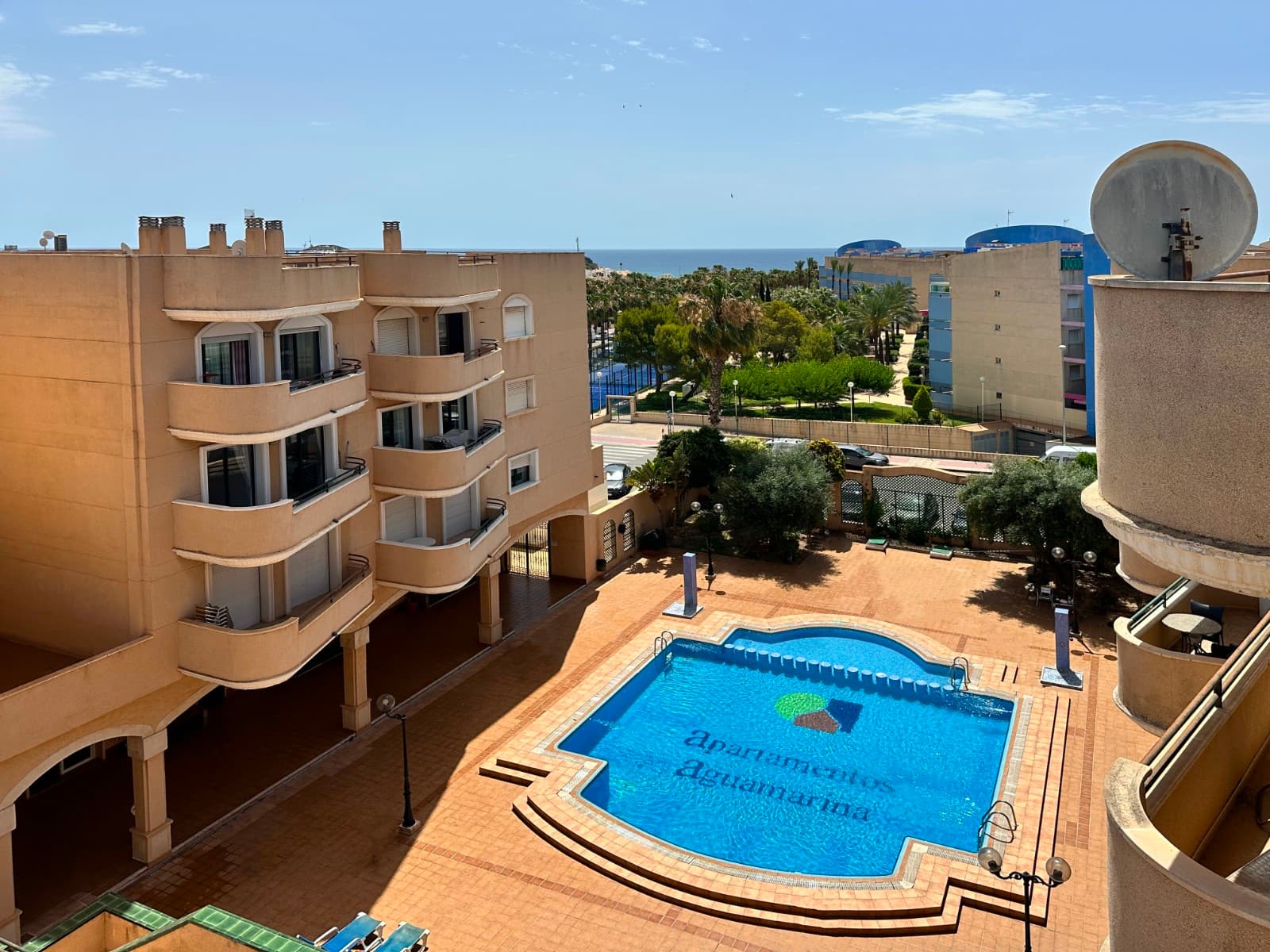 Tourist Apartments Aguamarina. Charming apartment with south orientation in Aguamarina, Cabo Roig - walking distance to sandy beaches and amenities. Welcome to this inviting apartment located in the popular and well-maintained residential complex, right in the heart of Cabo Roig, Orihuela Costa.Here you will find the perfect combination of comfort, relax, and proximity to everything the area has to offer! The apartment features 2 bedrooms, bathroom with window, and an open-plan living room and kitchen area, ideal for enjoying with family or friends. From the living room, you have direct access to a balcony with beautiful views of the Mediterranean Sea and the attractive communal pool area. It's the perfect spot for your morning coffee or relaxing dinners while feeling the sea breeze.Additionally, the apartment offers access to a communal rooftop terrace, where you can truly experience the spectacular panoramic views of the coastline and the sparkling blue sea - an ideal place for sunbathing, relaxing, or gathering with friends and family.The Aguamarina complex is known for its beautifully maintained common areas, with lush greenery and an inviting swimming pool, giving you a true resort-like feel. At the same time, you are within walking distance to a wide range of restaurants, shops, supermarkets, pharmacies, and all necessary services.Frequent bus connections to both Alicante city and Alicante airport make this a highly accessible location, even without a car. The beaches of Orihuela Costa - a paradise right on your doorstep.Just a short stroll from the apartment, you'll find the famous Cabo Roig Beach, known for its soft golden sand crystal-clear waters. Nearby, you'll also find other stunning beaches such as Playa de la Glea (Campoamor), La Zenia Beach, and Cala Capitan all proudly holding the Blue Flag certification for their quality and cleanliness.These coastal gems offer shallow areas perfect for families with children, as well as beach bars, restaurants, and various water sports activities for those seeking a bit more excitement.This superb retreat is available for immediate occupation or as a turnkey rental investment.Apartment for sale in Tourist Apartments Aguamarina in Orihuela Costa
