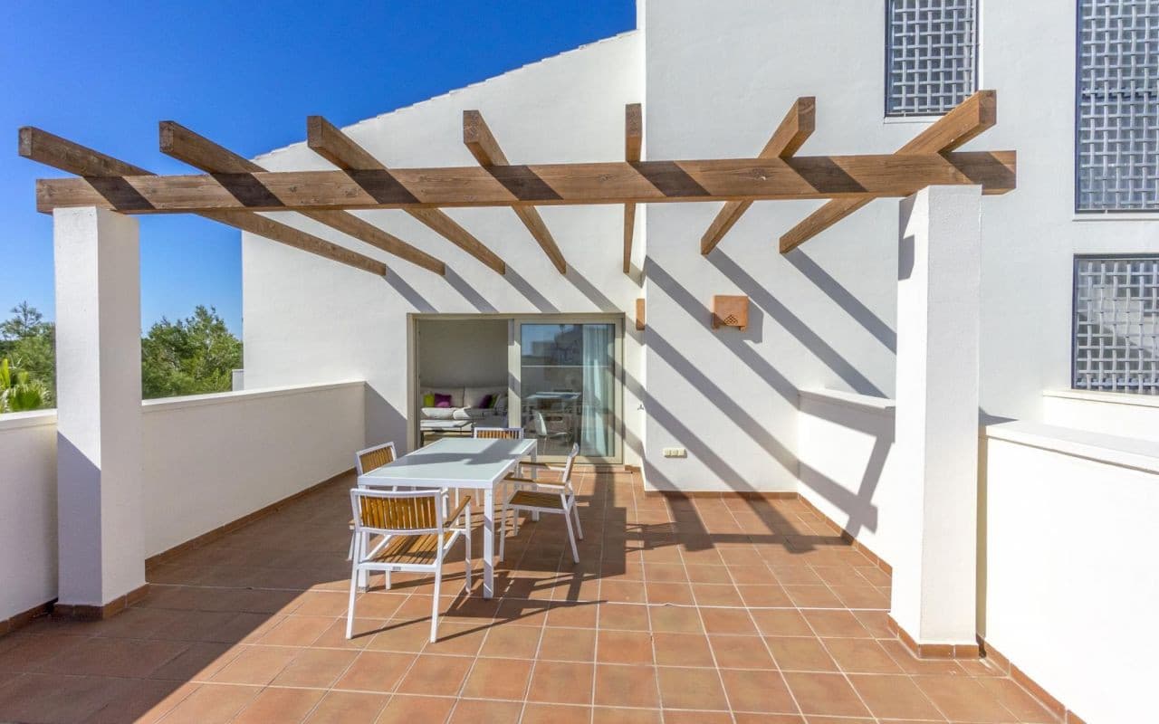 Discover this exclusive corner penthouse for sale in Las Colinas Golf & Country Club, Orihuela Costa. Located in the prestigious Encina community, this southeast-facing property boasts a spacious private terrace with stunning views of the Mediterranean forest and the sea beyond.The apartment features 2 bedrooms, 2 bathrooms, a separate kitchen with utility room, a bright living and dining area, and high-quality finishes including marble flooring, ducted air conditioning, and electric heating throughout. It is sold fully furnished and equipped.Set within a secure gated community with beautifully landscaped gardens and a communal swimming pool, the property also includes a covered parking space and a storage room. A unique opportunity to enjoy luxury living in one of Spain's most prestigious golf resorts.