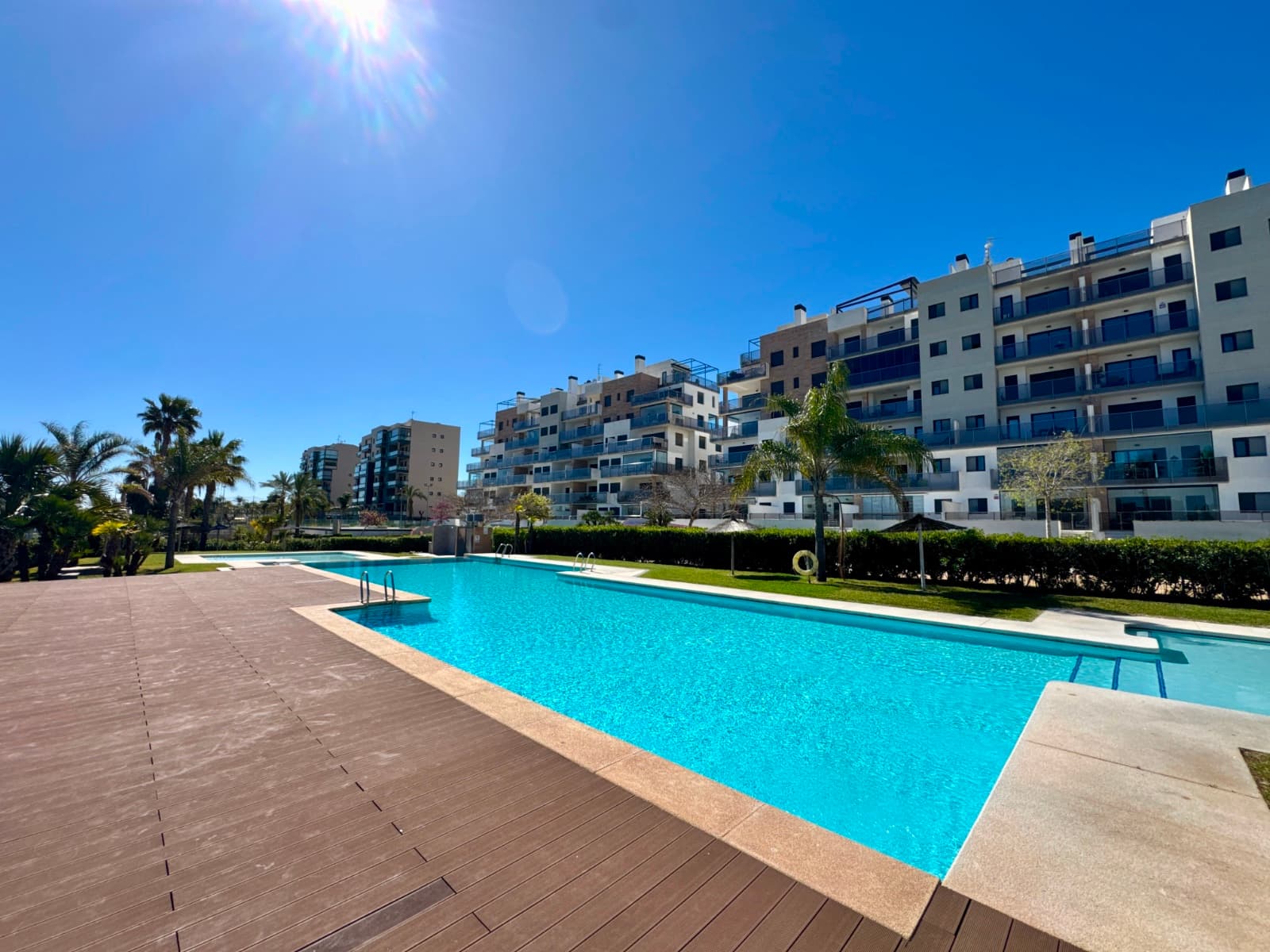 Discover this magnificent apartment located in the heart of the highly sought-after Mil Palmeras urbanization, just 250 meters from the white sand beaches. An exceptional location, renowned for its idyllic setting, lively beach bars open year-round, and immediate proximity to all amenities: paddle tennis, pharmacy, shops, and restaurants.A unique living environmentLocated in a secure, upscale residence, this apartment benefits from a spectacular communal area including:A large adult swimming pool with sunbed areaA children's poolGreen spaces and a playgroundA fully equipped gymHigh-quality amenitiesLocated on the 3rd floor, this northeast-facing apartment offers breathtaking panoramic sea views, perfect for enjoying the cool air on summer days.It comprises:An open-plan kitchenA bright living/dining roomTwo bedroomsTwo bathrooms (one en suite)A laundry roomOutdoor spacesA superb 19m² front terrace with sea viewsA second 4m² terrace adjoining the master bedroomComfort and securityGated and secure residenceUnderground parking spaceStorage cellar ideal for bicycles, beach equipment, or golf equipmentIdeal locationA perfect location for those who enjoy seaside walks, cycling, or golf. Take advantage of the many nearby restaurants, offering everything from fresh seafood to international cuisine. Just:5 km from Pilar de la Horadada8 km from La Zenia BoulevardA sound investment!Thanks to its exceptional location and highly sought-after sea views, this apartment offers excellent rental potential.The community grants tourist license applications. Community fees are in this case increased by 20%.A rare opportunity not to be missed! Contact us now to arrange a visit.IBI: €260/yearCommunity fees: €105/month