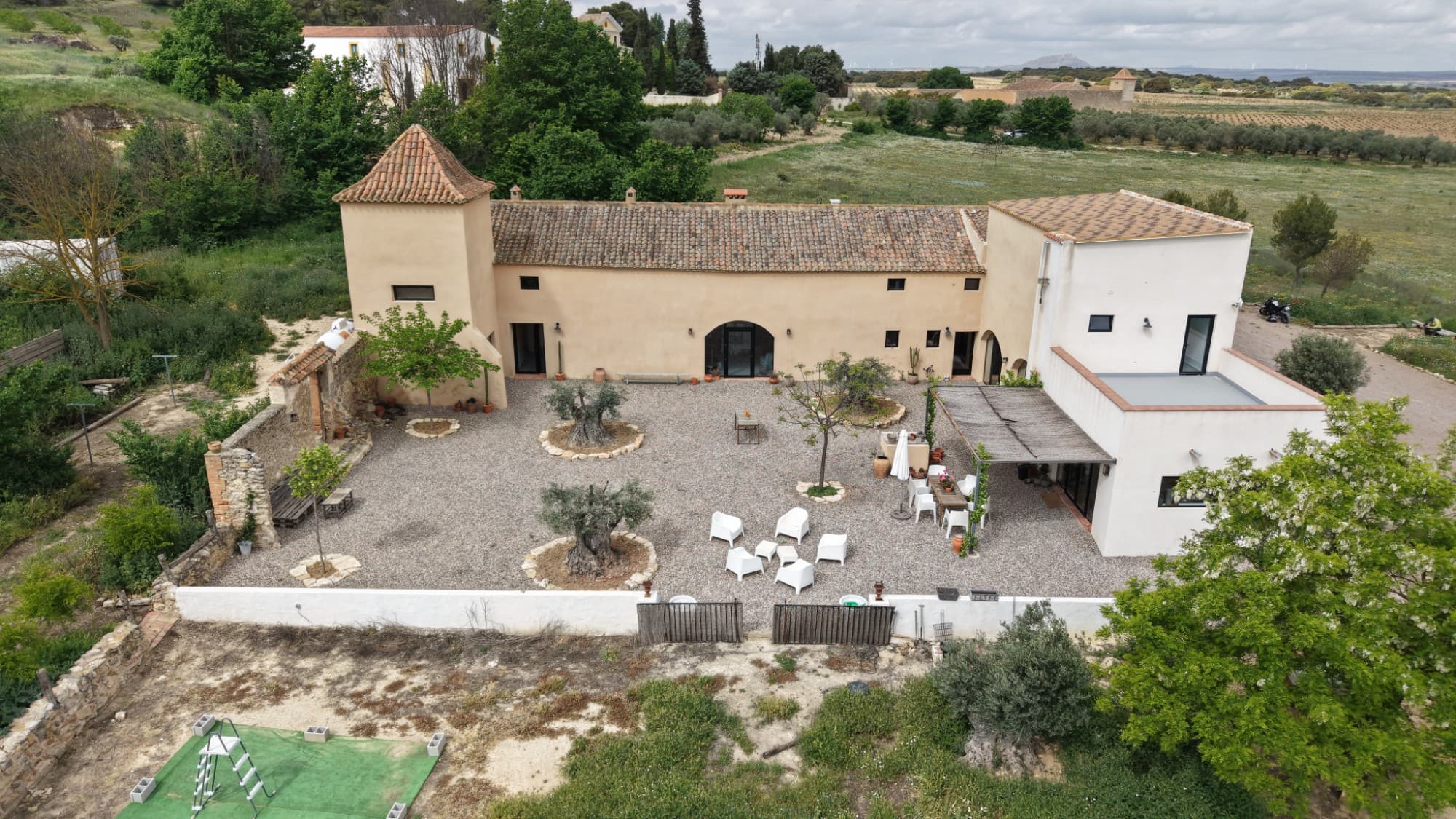 Unique Off-Grid Finca with Tourist Licence for sale in AlmansaAre you looking for a sustainable dream project in Spain? Immo MurciAlicante is proud to present this fully renovated, 100% self-sufficient finca. Situated on a spacious plot with breathtaking views on the border of the Castilla-La Mancha region, this property offers the perfect balance between authenticity, tranquillity and modern comfort.Authentic character, modern technologyThis traditional Masia (locally known as a casa de labor) is built from characteristic natural stone walls. The current owners have restored the property with an eye for detail, preserving the rustic architecture whilst integrating the latest technologies. The result? A unique, eco-friendly home that operates entirely off-grid thanks to a modern solar system (15kW) with 25kW lithium batteries, heat pomp with boiler heat reserve, underfloor heating and three private natural water sources.Layout of the propertyThe property is cleverly divided into a spacious private area and a ready-to-run B&B section:Private residence: A cosy living room, a bright dining room and a modern kitchen with a high-quality hob. On the ground floor, you will also find a bedroom, guest toilet, shower and an original wine cellar. The first floor offers space for a beautiful library and the potential to create five additional bedrooms, whilst the top floor houses the master bedroom: an oasis of tranquillity with an elegant bathroom and a private terrace offering panoramic views.B&B Section (licensed): With its own entrance and three elegant rooms, each with an en-suite bathroom, this section offers maximum privacy for your guests. There is also a separate laundry room and a utility storage room.A plot full of possibilitiesWith no less than 40,000 m² of mainly flat land, this estate offers endless possibilities. Consider setting up a small-scale campsite or an exclusive event venue. The grounds consist of a natural garden with wild flowers, ancient olive trees, a wooded area and a fertile vegetable garden including animal enclosures. No less than 10,000 m² is fully fenced in!Strategic locationThe finca is situated in a highly sought-after region between the villages of Almansa and Montealegre del Castillo.Privacy & Accessibility: Just 10 minutes from the centre of Almansa and easily accessible via the main road. The final stretch to the property, as well as the driveway, is unpaved and is maintained annually by a local farmer.Airport & Beach: Just over an hour’s drive from Alicante Airport and the sunny beaches of the Costa Blanca.Key features:Type: Off-grid Finca / Country HouseExtra: Tourist licence available (B&B)Sustainable: 100% self-sufficient (Solar energy & private water supply)Plot: 40,000 m²Condition: Fully renovated and partially furnishedWould you like to live and work in harmony with nature? Contact Immo MurciAlicante today to arrange a viewing and discover this unique Spanish paradise for yourself.