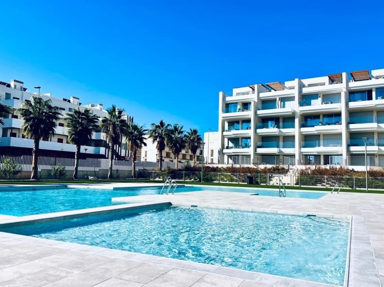 Luxury 2-Bedroom Apartment in a Prime Location. Discover this stylish second-floor apartment in EMA Residencial, Villamartín, located in one of the most sought-after areas of Orihuela Costa.The apartment features 2 spacious bedrooms, 2 modern bathrooms, a bright living area with an open-plan kitchen, and large windows that flood the space with natural light. With a living area of 94 m² and a spacious southwest-facing terrace of 23 m², this property offers the perfect combination of comfort, space, and Mediterranean outdoor living.From the living room, you have direct access to the sunny terrace overlooking the beautifully maintained communal areas, an ideal place to relax and enjoy the sun until the evening hours. The apartment also includes a private parking space and benefits from high-quality finishes with elegant, modern materials throughout.This gated residence, built in 2024, offers exclusive amenities such as a large communal swimming pool, children’s pool, fitness room, and landscaped green areas. In addition, the apartment has an Energy Rating B, ensuring energy efficiency and added living comfort.The beaches of Playa Flamenca and Cabo Roig, as well as the popular La Zenia Boulevard shopping centre, are located just 2.5 km away. Supermarkets, restaurants, bars, and all daily amenities are within walking distance. Golf enthusiasts will appreciate the exceptional location close to renowned golf courses such as Villamartín Golf, Las Ramblas Golf, Campoamor Golf, and the exclusive Las Colinas Golf & Country Club.Thanks to the Mediterranean climate with more than 300 days of sunshine per year, this apartment is ideal as a holiday home, permanent residence, or investment property with excellent rental potential.Interested&8364; Contact me today for more information or to schedule a viewing.