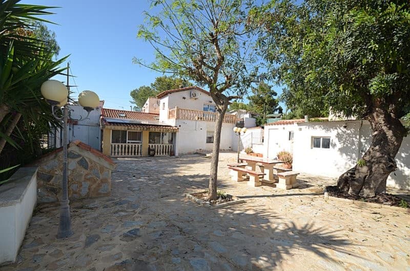 Cañadas de San Pedro, MurciaCharming 4 Bedroom Country House with Pool, Gardens & Double GarageKey Features:• 4 Bedrooms • Character country house • Vaulted ceilings and skylights • Stone-built fireplace • Walk-in wardrobe and en-suite to master bedroom • Solarium • Large gardens • Outdoor kitchen and entertainment area • Stone barbecue • Private 8x4 swimming pool • Two outbuildings • Double garage with electric door • Quiet location with excellent motorway accessSituated in the peaceful countryside of Cañadas de San Pedro, this nicely presented 4 bedroom country house offers character, space, and excellent outdoor living, while remaining conveniently close to Murcia City and the beaches of the Mar Menor.The property features a warm and welcoming lounge with vaulted ceilings, skylights, and an attractive corner stone-built fireplace, creating a cosy yet spacious heart to the home. The ground floor offers two bedrooms, a fully fitted kitchen with a large larder cupboard, additional hallway storage with floor-to-ceiling wardrobes, and a family bathroom complete with a large corner bath, shower over, WC, bidet and wash-hand basin with mirror above.Stairs lead to the first-floor landing featuring decorative glass blocks that allow natural light to flow throughout the space. The impressive master bedroom benefits from vaulted ceilings, a large walk-in wardrobe, and an en-suite shower room. A further upstairs bedroom has direct access to a private solarium, ideal for enjoying the surrounding countryside views.Outside, the property continues to impress with expansive landscaped gardens, a private 8mx4 m2 swimming pool, stone-built barbecue, and a fantastic outdoor kitchen and entertainment area that could also serve as a hobby room or gym. There are also two useful outbuildings and a double garage with electric door.Located in a quiet rural setting yet within easy reach of motorway connections, the property provides excellent access to Murcia City, the airport, and the beautiful beaches of the Mar Menor.A wonderful opportunity to enjoy peaceful country living with all amenities and coastal attractions within easy reach.The friendly and typical Spanish village of Sucina with its bars, restaurants and church square is approximately ten minutes away by car.Murcia International airport is located approximately 25 minutes away by car and Alicante airport approximately 1 hour 10 minutes by car.The historic city of Murcia is approximately 20 minutes away by car whilst Cartagena with its Roman ruins and port and marina is approximately 40 minutes away by car.The Costa Calida beaches running along the Mediterranean coastline are only a 20 minute drive away by car.Visit the GALLERY on our website to view photographs of places to visit in the local area and beyond.