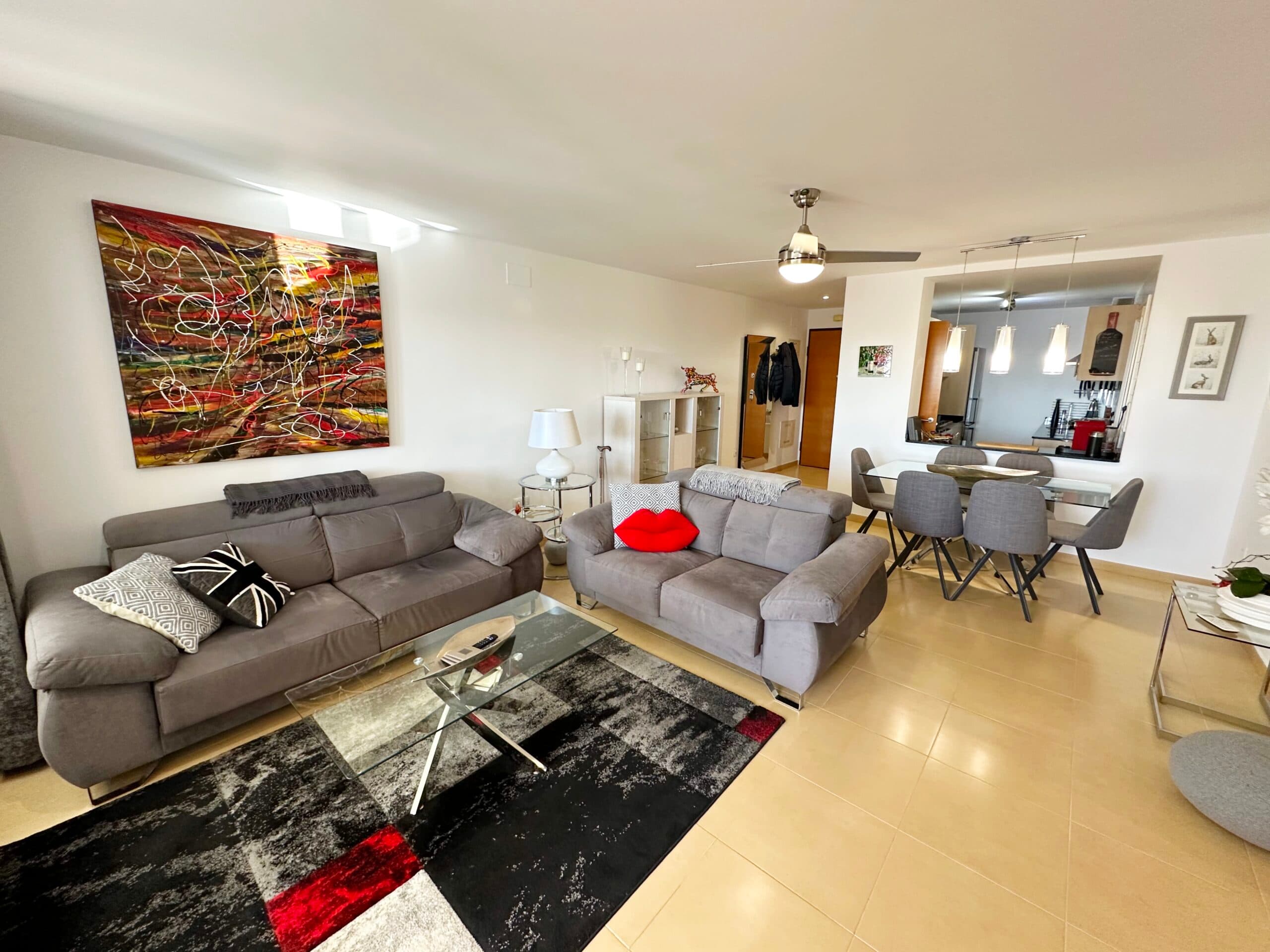 If you are looking for a spcaious three bed two bath SOUTH FACING apartment look no further as we have this splendid three bedroom south facing apartment on La Goleta just outside Mar Menor Golf Resort.  The apartment is in a prime location close to the bars and restaurants on the Boulevard and a 5 minutes walk to the resorts supermarket and MMGR club with padel, gym, mini golf and restaurant.  The apartment features several upgrades including glass curtains on the terrace and a walk in shower in the ensuite to the master bedroom.  The property is being sold furnished and has aircon in the lounge and two of the bedrooms and mosquito blinds on all doors. This property does not have access to the communal pools of MM2 but you can take a membership at the MMGR club to use their pool which is also heated for all year use.The property is accessed via a security lift to the second floor.  You enter in to the sunny open plan lounge diner with kitchen to the left.  The owners have updated the kitchen with new work tops, oven, hob and sink and enclosed the separate utility room.  The sunny lounge diner has access to a fantastic terrace where the owners have added glass curtains creating a wonderful year round use space.  The curtains can be opened up in the summer.  Here you can enjoy views over the countryside. There are three double bedrooms all with fitted wardrobes.  The master has an ensuite shower room and access to the terrace.  You will also find a separate guest bathroom.  The owners have added a door from the lounge to the bedrooms giving more privacy and warmth.  This is a very well maintained and beautifully presented apartment with high quality furnishings.  Please contact us to book a viewing appointment.