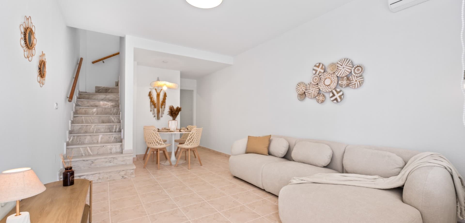This charming west-facing townhouse is located in the popular area of La Florida, Orihuela Costa, and represents an excellent property for sale in La Florida Orihuela Costa, offering comfort, natural light, and a great location close to all amenities.The property welcomes you with a spacious sunny front terrace, ideal for enjoying afternoon and evening sun.On the main floor, there is a bright and spacious living room, tastefully decorated, along with a guest toilet. The separate modern kitchen is in excellent condition and provides direct access to a private rear terrace, perfect for outdoor dining or relaxing.Upstairs you will find two well-distributed bedrooms with plenty of natural light, as well as a full bathroom. One of the bedrooms has access to a terrace that leads to a private roof solarium, ideal for enjoying sunsets or creating a chill-out space.The property is part of a well-maintained community with a communal swimming pool and gardens, offering a peaceful environment.Ideally located close to shops, restaurants, and services, and just a short drive to Zenia Boulevard, golf courses, and the beaches of Orihuela Costa.An ideal home near golf courses and the beaches of Orihuela Costa, and a great holiday home or investment property in Costa Blanca South.