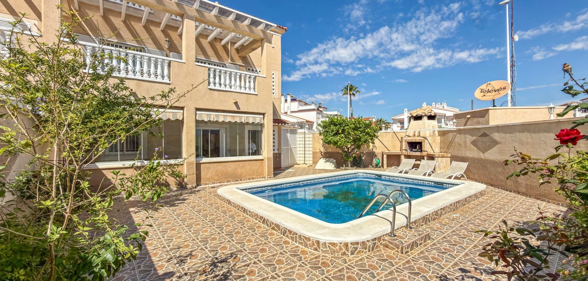 Located in the highly sought-after residential area of Zeniamar in Playa Flamenca, this spacious corner ground floor apartment offers the perfect combination of indoor comfort, outdoor living, and Mediterranean lifestyle.The property features three bedrooms and two bathrooms, making it ideal as a permanent residence, holiday home, or investment opportunity on the Costa Blanca.Inside, the home offers a bright and spacious open-plan living and dining area, complemented by a fully equipped kitchen and direct access to the outdoor spaces. One of the standout features is the beautiful glazed-in terrace of approximately 16 m² overlooking the private pool area — a perfect space to enjoy all year round.The apartment sits on an impressive corner plot with terraces and garden areas in two directions, providing sun and shade throughout the day. The front garden of approximately 138 m² includes a private swimming pool and generous entertaining areas, while the rear garden of approximately 48 m² offers additional privacy and outdoor space.The property is sold furnished and includes air conditioning for year-round comfort.A rare and highly valuable feature is the large private underground garage of 22.29 m² with direct internal access to the property, offering both convenience and security.Property sizes:Property: 101.91 m²Underground garage: 22.29 m²Glazed terrace: 16 m²Front garden with private pool: 138 m²Rear garden: 48 m²Zeniamar is one of the most popular urbanisations in the area, known for its beautifully maintained surroundings, excellent location, and close proximity to restaurants, shopping centres, beaches, and all essential amenities. The beautiful beaches of Playa Flamenca and the popular La Zenia Boulevard shopping centre are only a short drive away.This is a fantastic opportunity to own a spacious corner apartment with exceptional outdoor space and private pool in one of the best locations on the southern Costa Blanca.