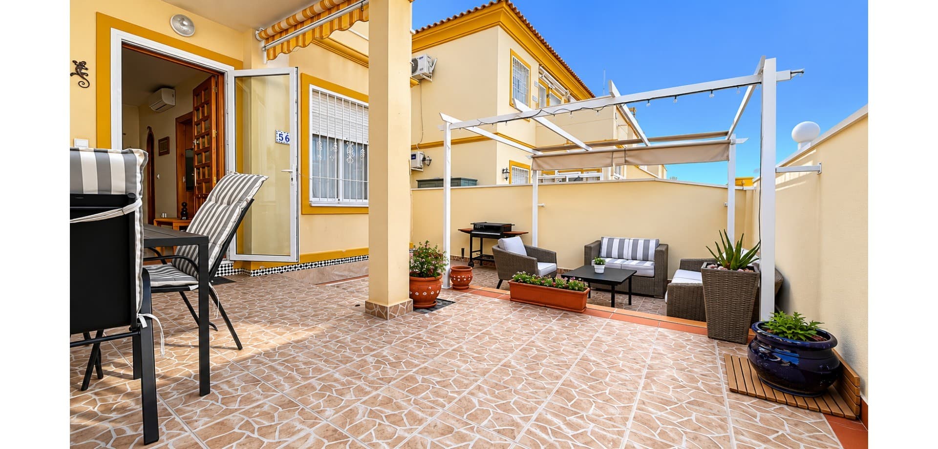 Located in a peaceful residential urbanisation with beautiful communal areas and a swimming pool, this charming ground floor bungalow offers comfort, outdoor living, and an excellent location on the Costa Blanca.The property features a spacious private patio of approximately 35 m², perfect for relaxing, outdoor dining, or enjoying the Mediterranean climate throughout the year. There is also a practical small storage room for additional convenience.Inside, the bungalow offers a bright living room, a functional kitchen with utility/laundry area, two bedrooms, and one complete bathroom. The property is sold fully furnished, making it ideal as a ready-to-move-into holiday home, permanent residence, or investment opportunity.The location is excellent, surrounded by all essential services and conveniently situated next to sports facilities and schools. The popular La Zenia Boulevard shopping centre and some of the best beaches of Orihuela Costa are only a few minutes away by car.This is a fantastic opportunity to purchase a comfortable bungalow in a quiet and well-connected area close to everything you need.
