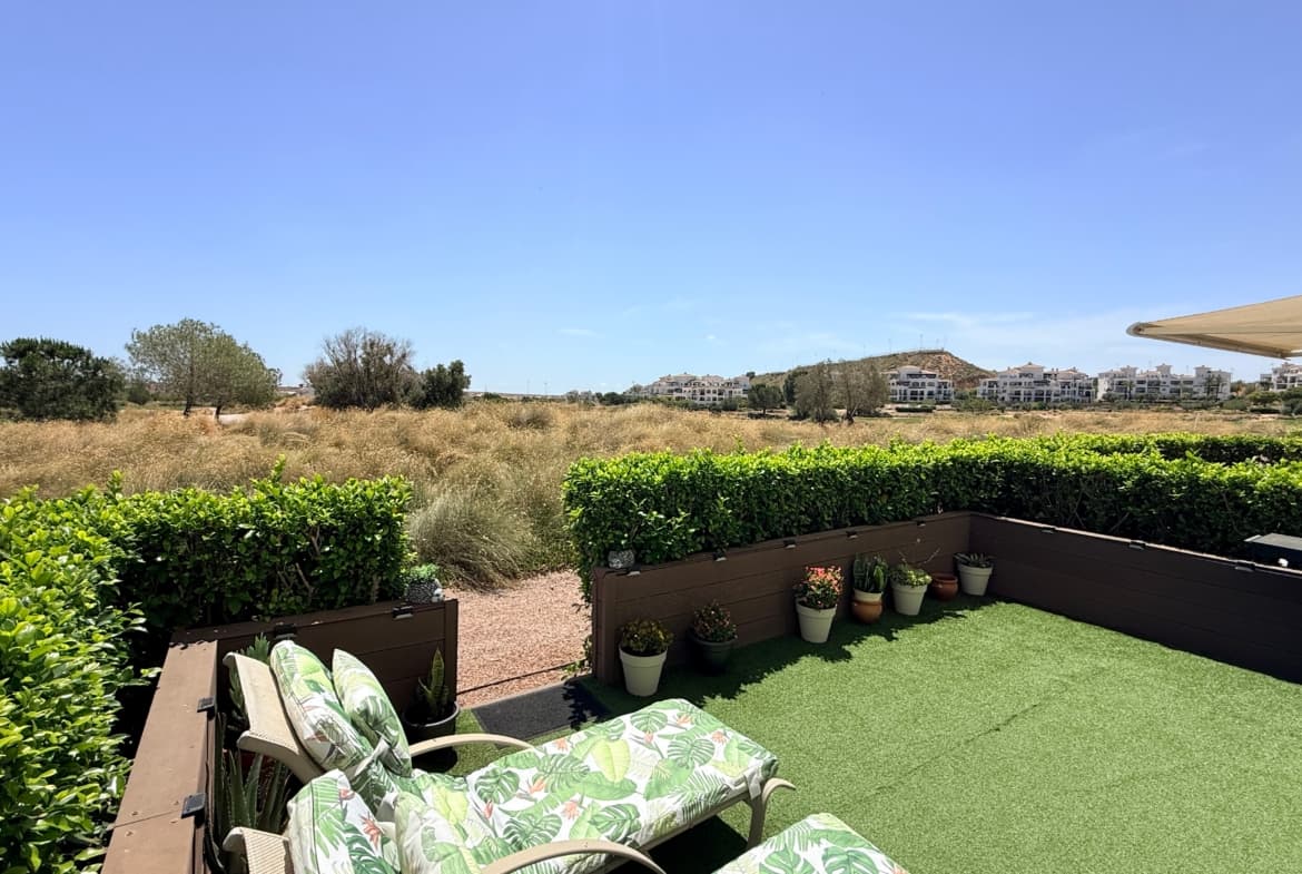 This exceptional 2-bedroom ground floor golf resort apartment offers a perfect blend of modern luxury and front-line golf course views.Fully updated, beautifully presented, and south-facing, this property is designed to capture the very best of the Mediterranean sunshine all year round.Inside, the apartment has been tastefully decorated in a sleek, contemporary style. It features two bright, spacious bedrooms and a fully renovated modern bathroom, offering a fresh and stylish feel throughout. The property is being sold completely furnished, making it an entirely turn-key opportunity for anyone looking to buy a property in Spain.One of the standout features of this home is the intelligently upgraded terrace area. Fitted with an innovative Openmax window system, this versatile glass curtain space transforms seamlessly with the seasons. In the summer, open the windows completely to enjoy a breezy, sun-drenched outdoor terrace perfect for alfresco dining. In the winter, close the system to create a cozy, fully usable glass room that retains the warmth while preserving those stunning panoramic golf views.The location within the resort is highly desirable. Situated with large, crystal-clear communal swimming pools on either side of the building, you can walk to a refreshing swim in less than 45 seconds.Whether you are looking for a permanent residence, a holiday getaway, or a premium rental investment, this south-facing apartment represents a true piece of paradise.Property Features:2 Bedrooms & 1 Renovated BathroomSouth-Facing Ground Floor PositionFront-Line Golf Course ViewsUpgraded Terrace with Openmax Glass Window SystemTwo Large Communal Pools Just a 30-Second Walk AwaySold Fully Furnished (Turn-Key)Price: 169,950 EurosView More Media:We have a full gallery of high-resolution photos and a professional 4K video walkthrough available for this property. Contact us today to receive the full media package or to arrange a viewing.