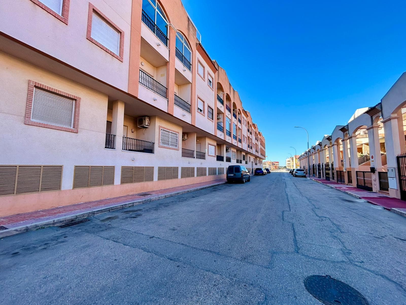 Are you looking for a quiet home where you can walk to the supermarket… and still reach Alicante or Murcia in under 40 minutes?Because this apartment gives you exactly that — tranquility, comfort, and excellent connectivity, all in one very competitive opportunity.Today we present this bright and well-maintained ground-floor apartment located in a very quiet and pleasant street. The building is in excellent condition, clean, luminous, and equipped with an elevator — making it comfortable and accessible for all ages.Although it is a ground floor, it enjoys good natural light and a northwest orientation, which means cooler afternoons in summer and a very comfortable indoor temperature throughout the year.The street is calm, with a relaxed neighborhood atmosphere — ideal for those who value peace without feeling isolated.Interior DescriptionThe apartment offers 75 m² of well-distributed living space and has been fully renovated, so it is ready to move in — no surprises, no extra renovation costs.It features:Two spacious bedrooms with built-in wardrobes, providing excellent storage and clean design lines.Two bathrooms — one with a bathtub for relaxing moments, and the other with a practical walk-in shower, offering convenience for everyday use.An independent kitchen, perfect for those who enjoy cooking without mixing smells or noise with the living area.A separate utility/laundry room, adding practicality and organization.A private balcony, ideal for enjoying fresh air, morning coffee, or a quiet evening moment.Brand new air conditioning, ensuring comfort during the warm Mediterranean summers.The renovation gives the home a fresh, modern feel while maintaining a warm and functional layout.ExtrasNew air conditioning, built-in wardrobes, elevator access, intercom system, balcony, and a recently updated interior — all adding value and convenience. It has special access for people with reduced mobility.Location & AccessibilityThe location is one of its strongest advantages:Supermarket just 350 meters away — daily shopping within walking distance.School only 650 meters away — perfect for families.Excellent road connections with easy access to main highways.Just 35 minutes to Alicante.Only 37 minutes to Murcia.You are perfectly connected to both cities and their airports, shopping centers, hospitals, and coastal areas, while enjoying a peaceful residential environment.This balance between connectivity and tranquility is not easy to find.Price & ExpensesThe property is offered at a very competitive price, making it an excellent investment opportunity or a perfect permanent residence.(We can provide detailed annual costs such as IBI and community fees upon request.)This apartment is ideal for:A couple looking for a comfortable and quiet home.A small family who values proximity to schools and services.Investors seeking a ready-to-rent property in a well-connected area.Retirees who want elevator access, comfort, and peace.It is move-in ready, well located, renovated, and competitively priced — a combination that does not stay long on the market.We warmly invite you to schedule a visit with us. Seeing it in person will allow you to truly appreciate its brightness, comfort, and potential.We will be delighted to show you your next home.