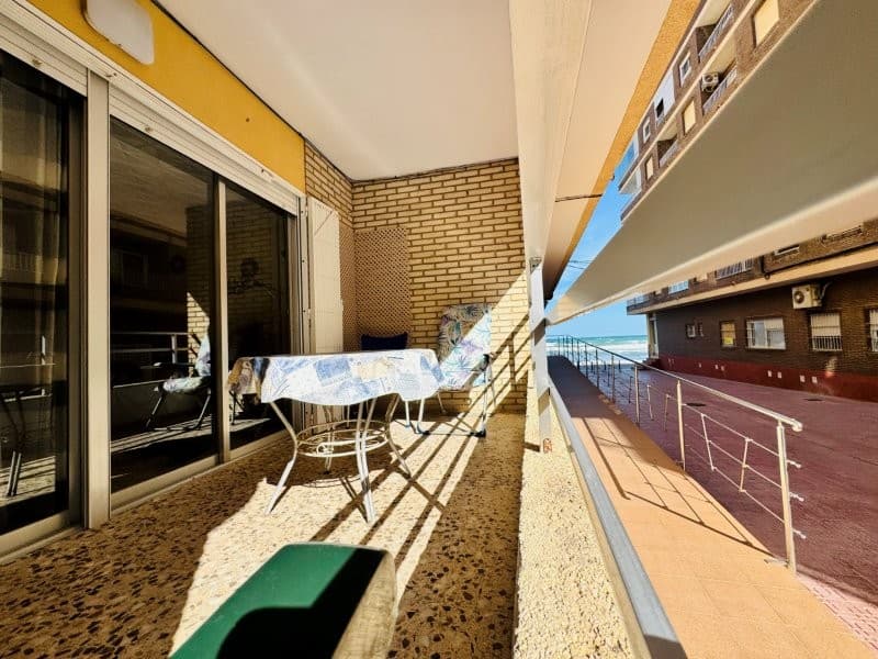 Ground floor apartment right on the seafront, in the center of La Mata, close to all amenities and restaurants.This is a unique property, one of a kind. 130 m2 just 10 meters from the beach.It comprises a spacious living-dining room, 3 bedrooms, 2 bathrooms, a separate kitchen with a utility room, and a south-facing terrace with sea views.The property is sold furnished.Property tax (IBI): €395