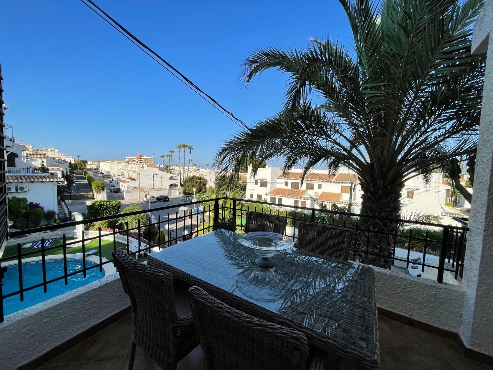 Newly renovated, very nice and comfortable first floor, south-east facing apartment. Air conditioning in all rooms, community pool, and enclosed terrace with glass curtains. 800 m from the beach.Located about a 7-minutes walk from the beach, close to numerous cafes and restaurants on Cabo Roig strip. Two double bedrooms, bathroom with walk-in shower, air conditioning in all rooms (bedrooms and living room). 65 m² of living space. Both the balcony and terrace overlook the pool and street. Covered parking in the complex.