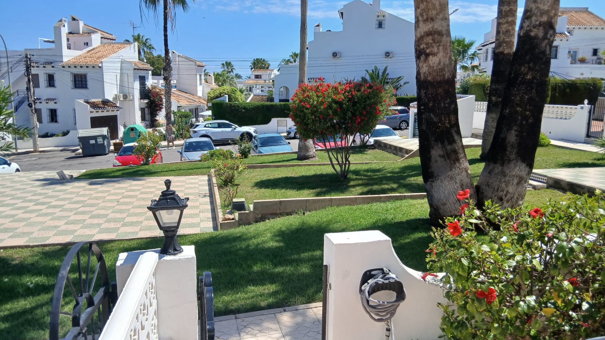SOUTH FACING charming 2-bedroom, 2-bathroom Townhouse in an exclusive residential area of Verdemar in Villamartin. Discover this magnificent townhouse located in a prestigious community, ideal for those seeking tranquility, comfort, and quality of life. The home features two spacious bedrooms, one full bathroom, one WC, and a large storage area under the property. Outside, it boasts a pleasant front garden and a spacious backyard, perfect for enjoying the excellent climate year-round, relaxing outdoors, or sharing unforgettable moments with family and friends, as well as roof top solarium with sea view in the distance. The community is distinguished by its well-maintained common areas, which include two fantastic communal swimming pools surrounded by a beautiful landscaped green area, creating a privileged and enchanting environment. Its excellent location, close to renowned golf courses, and all amenities makes this property an ideal option for a primary residence, second home, or investment. A home that combines elegance, nature, and well-being in an exclusive setting.