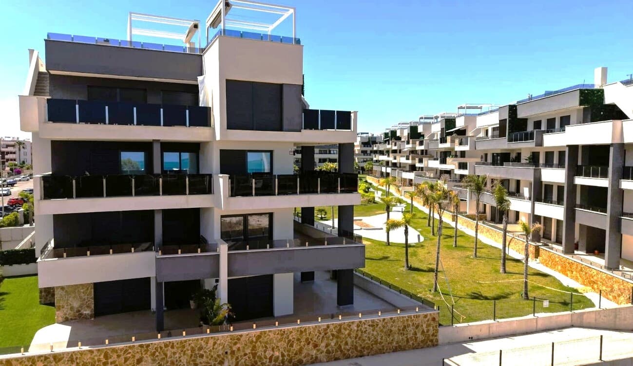 We present this this exceptional large, luxury apartment, with Panaramic Sea views, 3 Bedrooms, 2 Bathrooms, situated within the prestigious Amanecer Deluxe development, located within the popular area of Playa Flamenca.Built in 2025, the owner has only lived here for part of that time.The apartment is bright and spacious, with open plan living, each room offering sliding windows / Doors, designed to bring the outside and inside together, in order to appreciate the Spanish coastal living, with panaramic seaviews, from the impressive wrap around terrace. The terrace, has the added benefit of the views to the Gardens and Pool.This 2nd floor apartment, offers 3 double bedrooms all with Fitted Wardrobes and Doors leading to the terrace and including a superb master suite with a private en-suite bathroom.With a further Guest / family bathroom.As you enter the Lounge, Kitchen Diner, you're greeted by Breath taking views of the sea. This area is large and well distributed, offering 2 sets of doors to the Terrace.The apartment has a single Air conditioning system, that serves the entire apartment. There is a laundry cupboard on the Terrace, discreetly, where there is a water boiler and facility for Washing machine.There is a lift, to all floors and underground areasThis apartment offers a double parking space in the underground car park. *A neighbour has added electric shutters, to make this space more secure for additional storage.There is also a double size, storage cupboard, behind the parking spaces, full width of the car spaces.Residents of this beautifully maintained gated community enjoy access to an excellent range of exclusive facilities, including a large communal swimming pool, set within attractive landscaped gardens. Fully equipped communal gym, sauna, jacuzzi, and shower facilities.Ideally located just a couple of minutes walk from supermarkets, restaurants, bars, shops, and all essential amenities, this outstanding apartment perfectly combines generous living space, premium community facilities, and breathtaking views.IBI - €269.42 *2025 Community fees €To be confirmedWhether as a permanent residence, luxury holiday home, or high-performing rental investment, this is a truly exceptional property on the Costa Blanca. *Holiday rentals are subject to obtaining a tourist licence** White goods are staying - Other furniture negotiable
