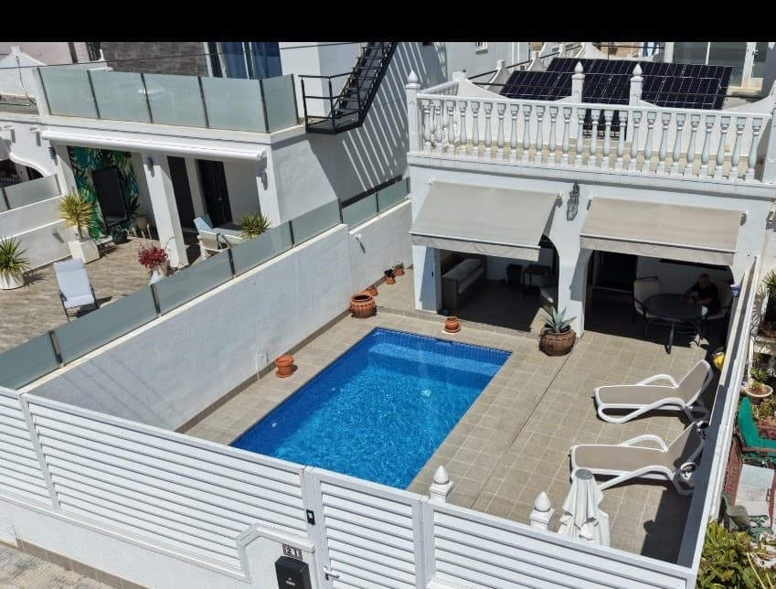 We present to you with this impressive 2 bedroom, single-story bungalow, with roof solarium and heated saltwater pool, complemented by solar panels to enhance energy efficiency. Conveniently situated, it is a mere 8 minutes from the bustling Villamartin - 10 minutes to the La Zenia Boulevard area, Beaches, Golf courses, and the popular Zoco Market.  This property is just 8 minutes drive from Villamartin, on the outskirts of the village of San Miguel De Salinas The owner has renovated the property over the last two years.The renovation includes:New Metal Fencing to the boundary of the propertyNewly built - HEATED and Covered - SALT WATER Swimming Pool to ensure all year round swimming. The pool has steps entery and a seating area at one end, the full width of of the pool.Newly tiled patio/terraceFreshly painted exterior to the house and boundary wallsNew Gas BoilerSOLAR PANELS – with Solar wallet to supplier and giving free ElectricityRefurbished BathroomRefurbished KitchenInternal walls Plastered to smooth finishNew fitted wardrobe to the main bedroomNew Air-conditioning units running also from wifi if required, allowing you to remotely start on a timer or immediately, from anywhere. Ideal if out and wanting a cool home to return to.New Remote controlled Ceiling FansImagine yourself sitting in the garden of this Beautiful South Facing property, being able to swim, all year round in the Newly Built, Heated Salt water Swimming pool or just simply relaxing on the Terrace.Entering the property, you have a bright spacious lounge and semi open plan to the kitchen which leads onto a utility area, which houses the Washing machine, Dishwasher & Fridge Freezer.The rear stairs lead to the Solarium which currently is home to the Solar Panels. (The Solarium has views to the Salt lakes and offers the potential to be extended to add further bedrooms and bathrooms)There are 2 Large Bright Bedrooms and a refurbished Bathroom.To the side of the property is an external Brick Built Storage area. LOCATION: This Semi Detached property, is just an 8 minutes drive from Villamartin, on the outskirts of the village of San Miguel De SalinasSan Miguel De Salinas, is a multi National community. It is just a 10 minute walk from the Village of San Miguel, which offers Supermarkets, Bars, Restaurants, Shops, Schools and more. There is also a Bar, just at the end of the road of which the Villa is situated.There is a bus service just a 2 minute walk from the house, taking you into La Zenia and also Torrevija (links to the airport). Also a good local Taxi service.Villamartin - GOLF - La Zenia Boulevard and local Beaches & Zoco Market are just a 8- 10 minute drive from the property.Padal Courts, Tennis Courts, Petanque, 5 Min walk from the property.The Village has Community Football pitches & large Community Swimming pool To arrange a Viewing contact us now, before it´s gone! 