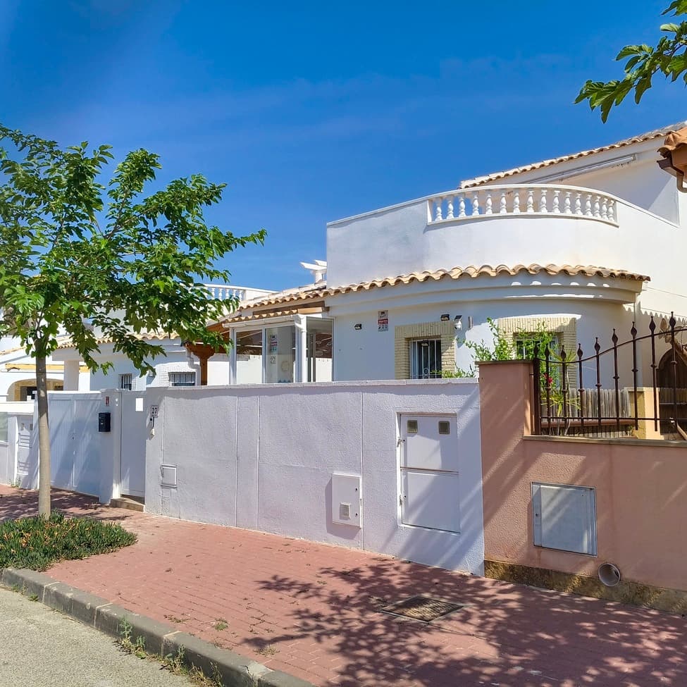 This beautiful detached villa in Sucina really has it all, plenty of indoor and outdoor space and close to all amenities whilst situated in a quiet residential street.  The entrance to the garden is private, there is a pedestrian gate and a drive gate and a high wall.  The drive gate leads to a covered car port/terrace and pedestrian gate leads straight to the front door of the villa with sunny garden at the front of the villa, covered terrace along the side of the building and a large private terrace at the back of the villa complete with stairs to an upper terrace.  The house enters into a glass porch area with sitting area and views to the garden.  The main door of the villa leads into a spacious living room with curved wall feature furnished tastefully with curved sofa, armchair, airconditioning and units leading to an open plan kitchen with granite worktops, fully fitted kitchen units, cooker and extractor, fridge freezer and washing machine.  The ground floor has 2 bedrooms, the first is a double to the rear of the house with double bed, air-conditioning and fitted wardrobe.  The second bedroom is a smaller double currently furnished with single bed and drawer unit, also with fitted wardrobes and patio doors leading to the conservatory.  The rear conservatory is a large room with wooden ceiling and glass walls leading to the back garden, it is a large multifunction room with leather sofas and dining table/chairs. There is a bathroom downstairs with walk in shower, vanity unit and wc.  The living room features a granite stairwell leading to the first floor where it leads to the third bedroom with en-suite bathroom; the bedroom is a double room currently furnished with a single bed; it leads to a bathroom with a shower, wc, and wash hand basin.   This bedroom comes with its own private terrace.  There is another front terrace off the upper hallway with views over the rooftops and to the countryside.  This villa is situated in the traditional Spanish village of Sucina with all amenities within a 10 minute walk; shops, restaurants, pharmacy, doctors.  Situated just 20 minutes drive from the coast, 20 minutes drive to Murcia airport and 25 minutes drive to Murcia city, this villa is very well located.