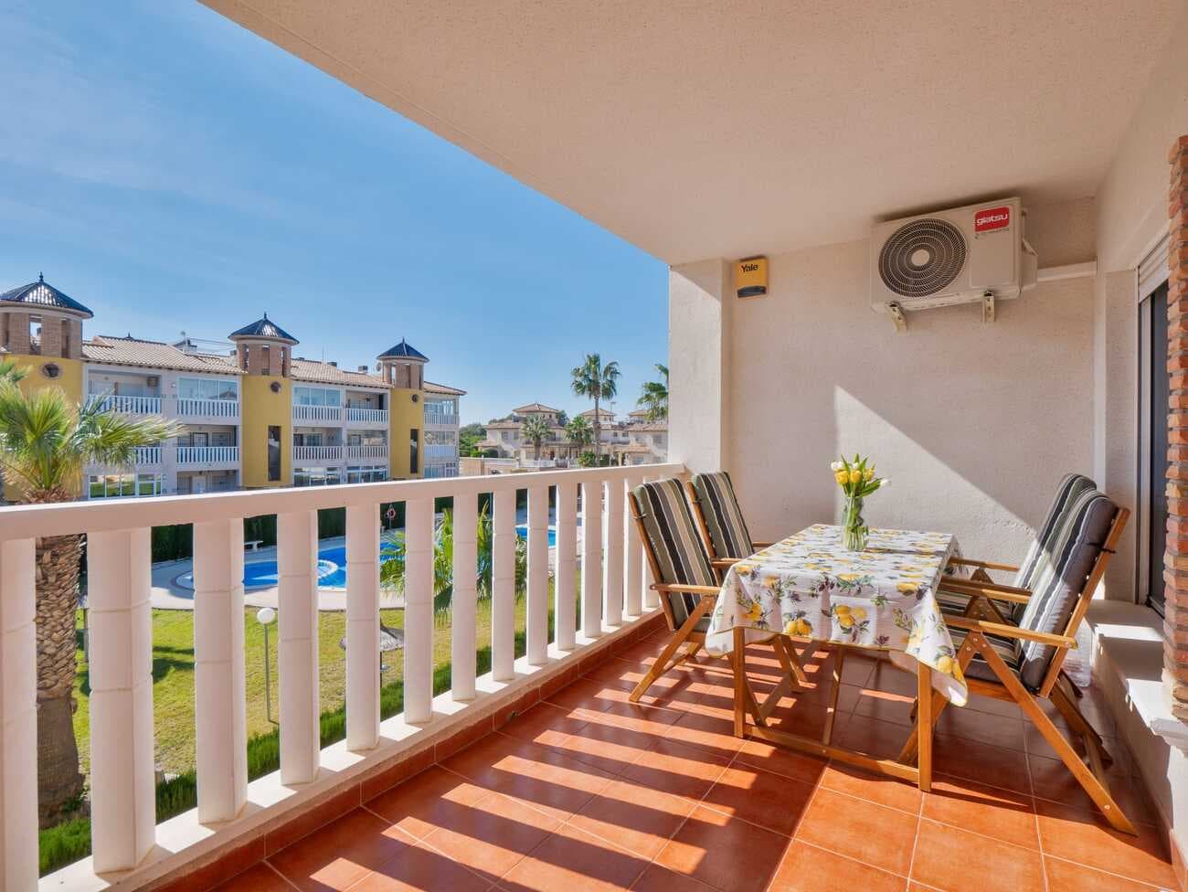 This beautifully presented penthouse apartment is situated in the sought-after Pinada Golf I community, near Villamartin. The apartment boasts a bright and spacious lounge-diner that opens onto a large south-facing terrace, offering plenty of sunshine and views of the communal pool. The lounge also leads to two double bedrooms with built-in wardrobes, as well as a family bathroom. At the back of the apartment, you'll find a separate kitchen and utility room. In addition, there's a generous solarium terrace above and a large storeroom. The property comes tastefully furnished and includes air conditioning. It enjoys access to a fantastic communal pool just a short walk away. Ideally located, the apartment is within walking distance of bars, shops, and restaurants, as well as two larger commercial hubs—Villamartin Plaza and the La Fuente commercial centre. A local bus service connects to La Zenia and Cabo Roig, and the beautiful local beaches are just a 10-minute drive away, as is Zenia Boulevard, the largest shopping centre in Alicante Province. For golf enthusiasts, there are four top-tier courses (Villamartin, Campoamor, Las Ramblas, and Las Colinas) all within a 5-minute drive. Contact our team to schedule a viewing at your earliest convenience.