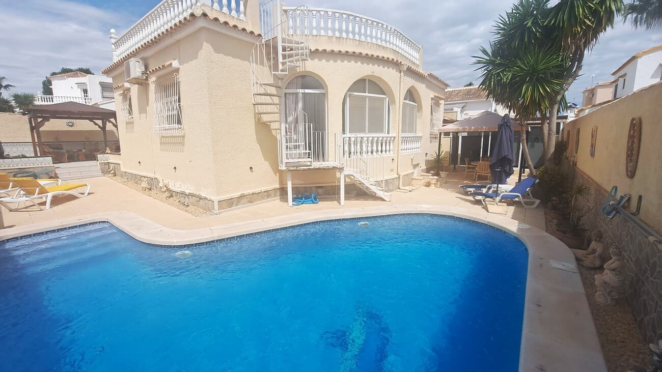 South-facing 3-bedroom detached villa with a private pool, situated in the desirable El Presidente area of Villamartin. Set on a 400m² walled plot, this charming property offers generous outdoor space, including a private pool, an outdoor summer kitchen with BBQ, and an annex featuring a games room with an additional shower room.The villa is accessed leading into a bright living room, dining area and a modern separate kitchen. There are three double bedrooms, the master bedroom includes en-suite modern bathroom plus two additional double bedrooms, a shower room and a family bathroom. Additional features include a rooftop solarium with sea views and secure gated off-street parking. There is a shaded  wooden pergola next to the large BBQ area, perfect for entertaining family and guests. There is also a store room under the property with space to develop further.Just a 15-minute walk from the renowned Villamartin Plaza, offering a wide selection of bars and restaurants. The golf courses of Villamartin, Las Ramblas, and Campoamor are easily accessible. La Zenia Boulevard shopping center and the beaches of Orihuela Costa are both less than a 10-minute drive away.Contact our team now for soonest viewing!