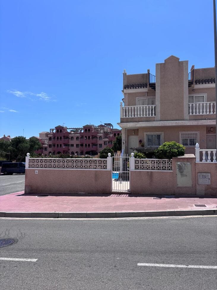 This beautifully presented 3 bedroom, 2 1/2 bathroom Townhouse is located in the highly desirable area of Villamartin, close to an excellent selection of bars, restaurants, shops, and local amenities.The property offers a bright and spacious lounge, a fully fitted kitchen, and generously sized bedrooms, each with its own private balcony, providing plenty of outdoor space to relax and enjoy the surroundings.A standout feature of this home is the large private solarium, perfect for sunbathing, entertaining, or enjoying panoramic views. Outside, the property boasts extensive terrace areas and a private swimming pool, creating the ideal setting for outdoor living.The underbuild provides excellent additional accommodation, including the third bedroom and a shower room, making it ideal for guests, extended family, or extra privacy. There is also a garage/storage area offering practical additional space.This fantastic villa combines comfort, space, and an unbeatable location, making it ideal as a permanent residence, holiday home, or investment opportunity in sunny Costa Blanca.