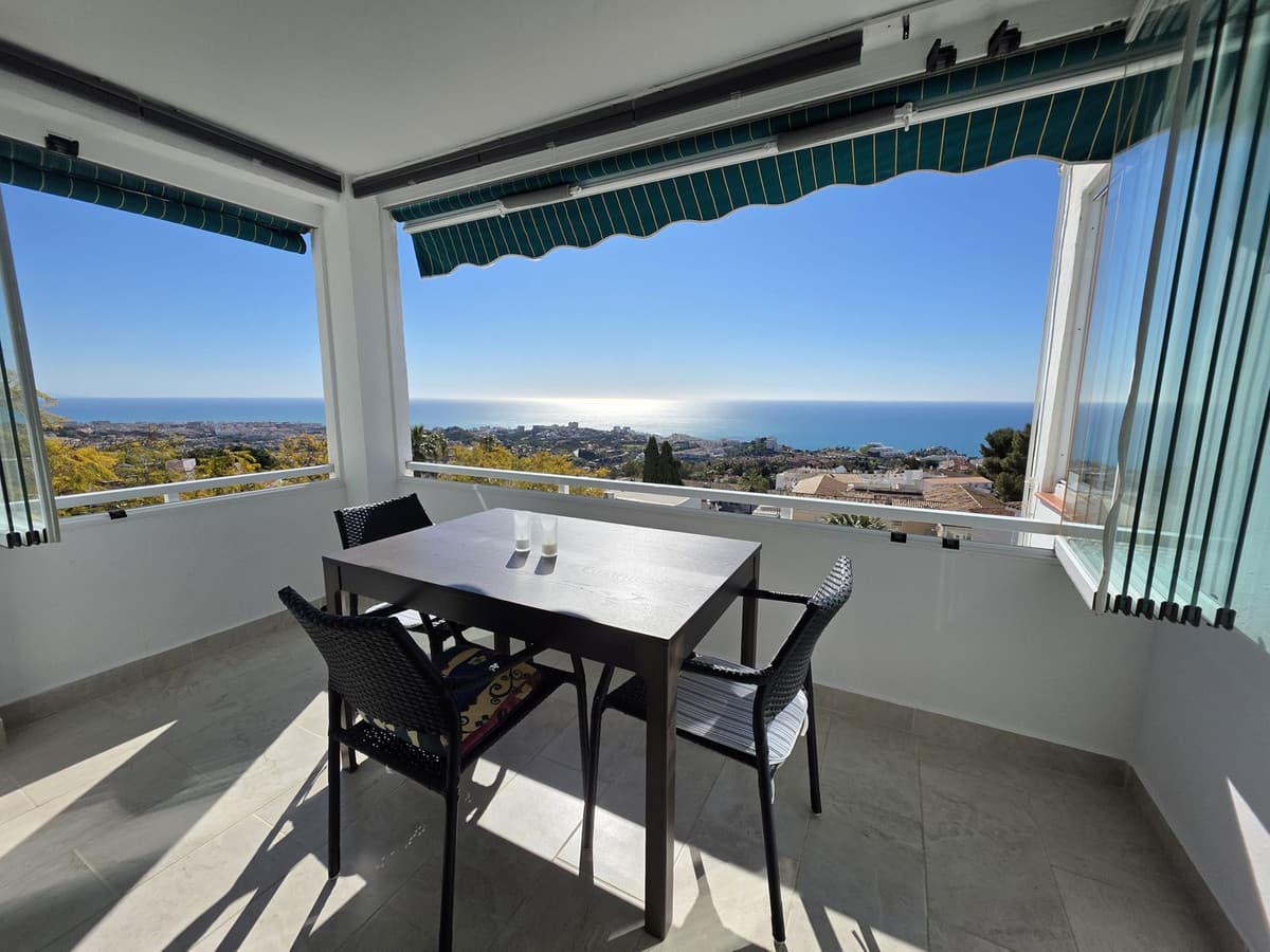 Top-Floor Corner Apartment with Sea and Mountain Views – Benalmádena PuebloBeautifully renovated 3-bedroom apartment located on the third and top floor of a charming building in Benalmádena Pueblo. This corner unit enjoys complete privacy with no neighbours above and offers stunning panoramic views of the sea and mountains.The property has been recently renovated to the highest standard. Every detail has been carefully updated to create a bright, stylish, and comfortable living space.The terrace includes folding glass enclosures, making it ideal for year-round enjoyment — open during summer or closed during cooler months. The apartment is also equipped with air conditioning for total comfort in all seasons.The apartment consist of 3 bedrooms, 1 modern bathroom, and a separate toilet.Perfectly located only a few steps from Benalmádena Pueblo’s restaurants, cafés, shops, and all amenities, yet in a peaceful residential setting. Please note: the building does not have an elevator.An excellent opportunity for those seeking a move-in ready home, holiday property, or rental investment in one of the most sought-after areas of Benalmádena
