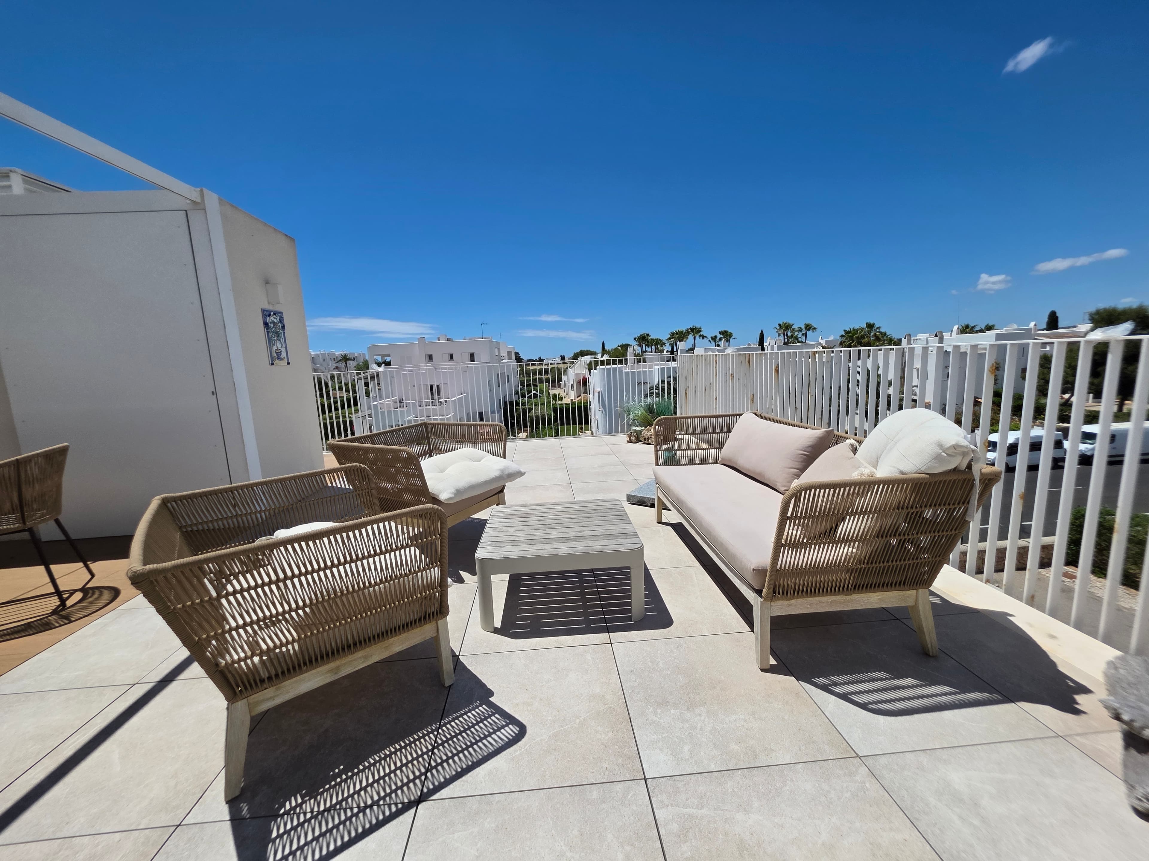 Stylish Penthouse with Expansive Terraces, Partial Sea Views & Private Parking in Cala EgosElegant penthouse apartment with generous terraces, partial sea views and private parking in Cala Egos. Located just a short walk from the beach, marina, restaurants and cafés, this stylish property offers the perfect blend of comfort, outdoor living and Mediterranean charm.The apartment offers approximately 60 m² of interior living space together with two fantastic terraces of approximately 65 m² and 12 m², creating several inviting outdoor areas ideal for relaxing, sunbathing or dining with family and friends. Large sliding doors allow plenty of natural light to flow through the apartment and create a seamless transition between the indoor and outdoor spaces.Inside, the property features a bright open-plan living and dining area with a modern fully equipped kitchen, two double bedrooms with fitted wardrobes, and two elegant bathrooms with walk-in showers, including one en suite.The penthouse is sold including the tasteful and high-quality furniture, making it ready to move into and enjoy immediately. A private parking space is also included.The property enjoys a peaceful location close to the beautiful coves and the lively marina atmosphere of Cala d’Or and Cala Egos. From the terraces there are pleasant open views with glimpses towards the sea, creating a wonderful holiday feeling all year round.A superb opportunity for anyone looking for an easy lock-up-and-leave holiday home or an elegant base in the sunny southeast of Mallorca.