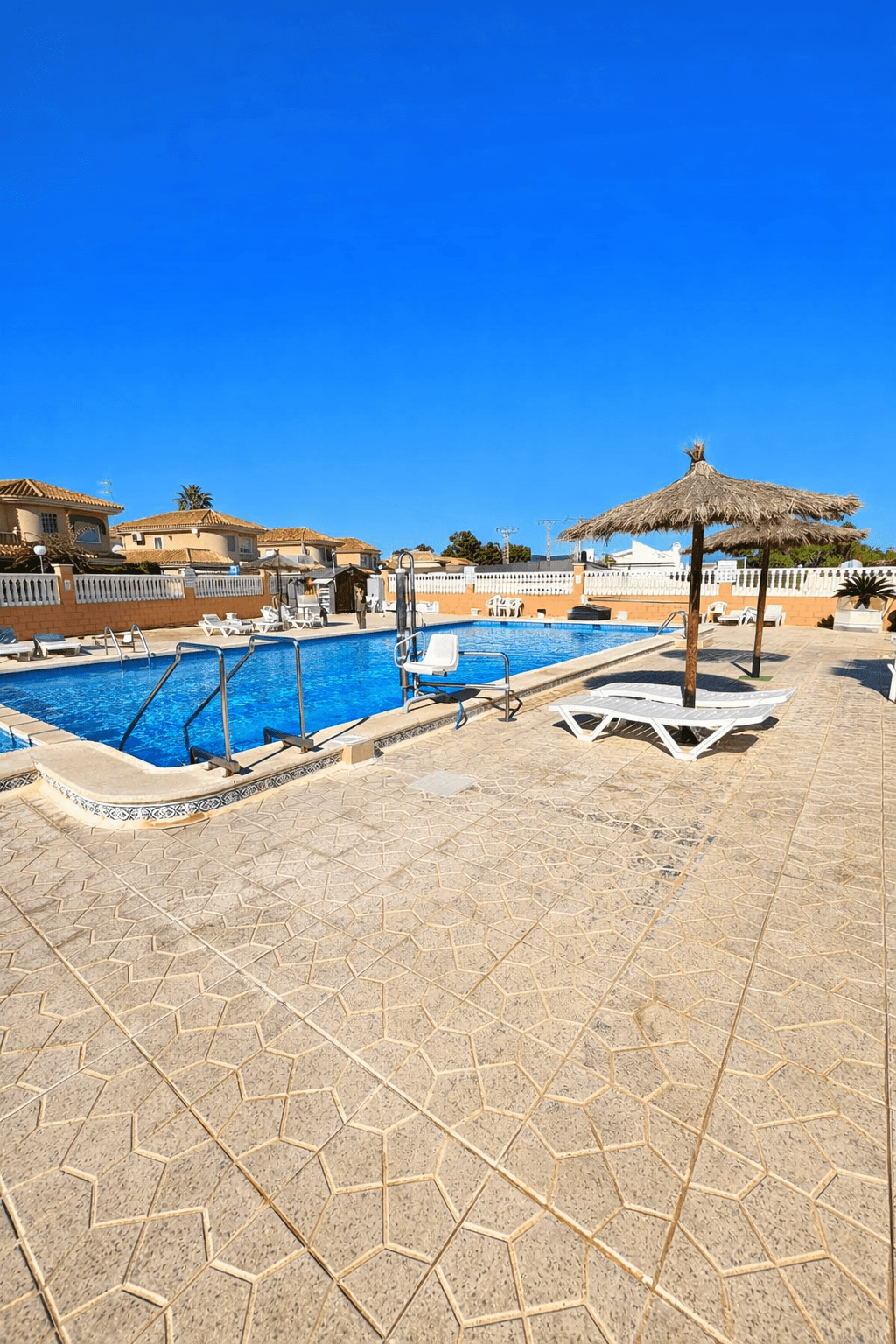 Enjoy the Mediterranean lifestyle in this charming top-floor bungalow of 65 m² located in Torrevieja, close to all essential amenities such as bars, restaurants, supermarkets, pharmacies, and shopping centers. Thanks to its south-facing orientation, the property benefits from natural sunlight all day long, creating bright and pleasant living spaces .This well-maintained home offers 2 bedrooms, 1 bathroom, a modern open-plan kitchen, and a sunny terrace perfect for relaxing outdoors or enjoying evening meals. In addition, the property features a private solarium, providing extra outdoor space to make the most of the warm climate. The bungalow is part of a residential complex with a communal swimming pool, ideal for cooling off during the summer months .The location offers excellent connectivity to AlicanteElche Airport, approximately 50 km away (4555 minutes by car) . Type Top-floor bungalow Location Torrevieja Built area 65 m² Orientation South Bedrooms 2 Bathroom 1 Kitchen Open-plan Terrace Yes Solarium Yes Communal swimming pool Yes Furnished and equipped with appliances Price €132,000 IBI €92 Community fees €90 quarterlyPicture your days under the sun, with everything you need within easy reach. Contact us today to arrange a viewing .