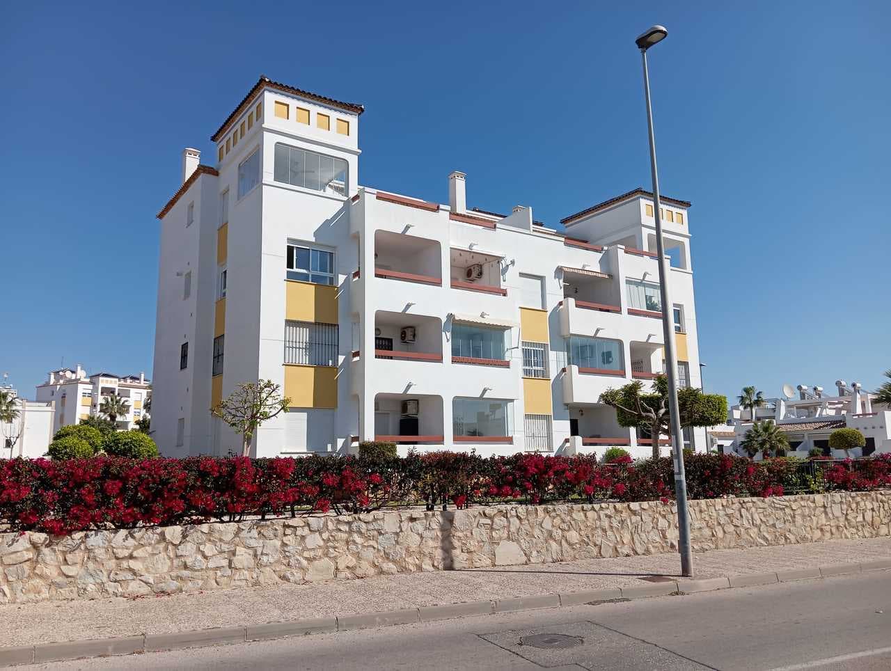 This spacious sunny 2 bedroom apartment, on the second floor, is situated in the popular area of La Fuente, Villamartin, Alicante.The property boasts a spacious living/dining room, a modern open plan kitchen, two bedrooms with fitted wardrobes, two bathrooms (one is en-suite), a large south/east facing terrace with distant sea views, and there is a communal rooftop terrace/solarium with amazing views.This is a lovely gated community with a beautiful communal garden with swimming pool and off road parking.Location, location, location because this fantastic property is within walking distance to the La Fuente commercial centre with many bars, restaurants, shops, supermarkets. Close to various golf courses and the beautiful Orihuela Costa beaches.