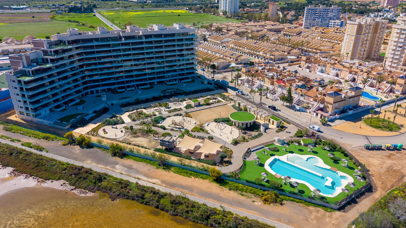 This is your chance to enjoy the most breathtaking views from this beautiful apartment, located directly on the coast, and to feel the gentle sea breeze blowing through your hair. The panoramic views of the shimmering sea and the famous La Manga Strip are simply unforgettable. Imagine being just minutes away from the pristine Calblanque Natural Park, where you can enjoy unspoiled nature and idyllic beaches. Explore the magical surroundings, take beautiful walks, and discover the natural beauty of this unique location. Just 3 km away, you will find the charming village of Cabo de Palos with its picturesque harbor, where you can enjoy cozy restaurants and delicious local cuisine. There is also a gym with a private locker, handy for storing your belongings when you go for a workout or swim. And for those who like to party, there is a ‘Community Gourmet Room’ in the garden. This is a space that anyone can use to organize private parties. There is also a sports center 200 m from the building with a very extensive fitness area, paddle courts, etc. This beautiful apartment, built in 2021, features 3 spacious bedrooms and 2 stylish bathrooms, all with a modern and inviting look. The fully equipped open-plan kitchen is a dream for every kitchen enthusiast, while the elevator, underground parking, and storage offer you the convenience you deserve. The living area opens onto a cozy terrace where you can relax and enjoy the sunset over the sea. The communal garden with a swimming pool and playground is the ideal place to unwind and spend quality time with family and friends. You must not miss this unique opportunity! Discover the true meaning of luxurious living and enjoy all the benefits this amazing location has to offer. Don't wait any longer – it is time to take action! Experience the magic of a beachfront apartment and create unforgettable memories on the coast of your dreams. Contact us today and open the door to your new adventure! First-line beach apartment for sale. Apartment with sea view and view of the La Manga Strip. Just a few minutes from the Calblanque Natural Park with pristine nature and beaches. 3 km from Cabo de Palos with its picturesque harbor. 3 bedrooms, 2 bathrooms, fully equipped open-plan kitchen, elevator, air conditioning, underground parking, storage room, terrace, communal garden with swimming pool and playground.This is your chance to enjoy the most breathtaking views from this beautiful apartment, located directly on the coast, and to feel the gentle sea breeze blowing through your hair. The panoramic views of the shimmering sea and the famous La Manga Strip are simply unforgettable. Imagine being just minutes away from the pristine Calblanque Natural Park, where you can enjoy unspoiled nature and idyllic beaches. Explore the magical surroundings, take beautiful walks, and discover the natural beauty of this unique location. Just 3 km away, you will find the charming village of Cabo de Palos with its picturesque harbor, where you can enjoy cozy restaurants and delicious local cuisine. There is also a gym with a private locker, handy for storing your belongings when you go for a workout or swim. And for those who like to party, there is a ‘Community Gourmet Room’ in the garden. This is a space that anyone can use to organize private parties. There is also a sports center 200 m from the building with a very extensive fitness area, paddle courts, etc. This beautiful apartment, built in 2021, features 3 spacious bedrooms and 2 stylish bathrooms, all with a modern and inviting look. The fully equipped open-plan kitchen is a dream for every kitchen enthusiast, while the elevator, underground parking, and storage offer you the convenience you deserve. There is no “step” to go to the terrace, so inside is outside, you can easily go from your living room to the terrace with a walker or a wheelchair. The same goes for the bedroom. The living area opens onto a cozy terrace where you can relax and enjoy the sunset over the sea. The communal garden with a swimming pool and playground is the ideal place to unwind and spend quality time with family and friends. You must not miss this unique opportunity! Discover the true meaning of luxurious living and enjoy all the benefits this amazing location has to offer. Don't wait any longer – it is time to take action! Experience the magic of a beachfront apartment and create unforgettable memories on the coast of your dreams. Contact us today and open the door to your new adventure! First-line beach apartment for sale. Apartment with sea view and view of the La Manga Strip. Just a few minutes from the Calblanque Natural Park with pristine nature and beaches. 3 km from Cabo de Palos with its picturesque harbor. 3 bedrooms, 2 bathrooms, fully equipped open-plan kitchen, elevator, air conditioning, underground parking, storage room, terrace, communal garden with swimming pool and playground.