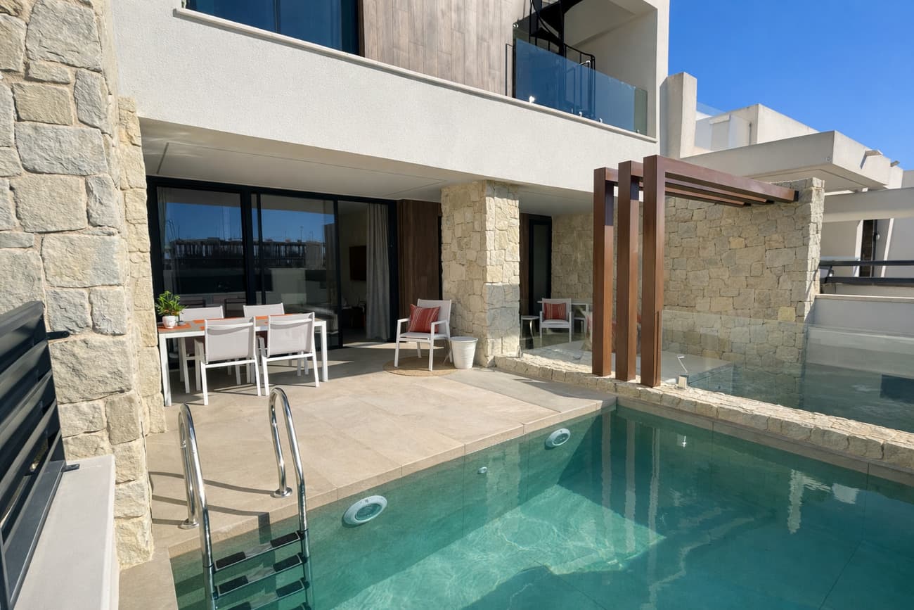 This modern and fully furnished townhouse was completed at the end of October 2025 — and no one has ever lived in it! It combines the elegance of new construction with the comfort of being completely key-ready, waiting for its first owner.<br /><br />Property Highlights<br />•⁠ ⁠Living area: approx. 163 m²<br />•⁠ ⁠3 bedrooms and 3 bathrooms (including one ensuite)<br />•⁠ ⁠Master bedroom with walk-in wardrobe<br />•⁠ ⁠Private pool with built-in LED color lighting<br />•⁠ ⁠Large solarium with pergola, mountain views, and solar panels<br />•⁠ ⁠South-west orientation for all-day sunshine<br />•⁠ ⁠Completely furnished – every piece of furniture is brand new!<br />•⁠ Energy Certificate : A<br />Step inside and you’ll immediately feel the bright, open atmosphere of this contemporary home.<br />The ground floor features a spacious open-plan living and dining area with a modern kitchen and direct access to the terrace and private pool – perfect for entertaining or relaxing under the sun. You’ll also find a full bathroom, a patio, and a laundry area with washing machine and dryer.<br />Upstairs, there are three comfortable bedrooms and two bathrooms, including the ensuite in the master. One of the bedrooms also opens onto a private terrace with access to the rooftop solarium.<br />The solarium is equipped with a pergola, solar panels, and outdoor furniture, offering stunning mountain views. There’s also plenty of space to install a summer kitchen or barbecue area, creating your own rooftop oasis.<br />The huge basement offers endless possibilities: it can be converted into a home cinema, guest apartment, gym, man cave, or simply used as additional storage space.<br />Surroundings & Location:<br />This home enjoys a privileged location in a peaceful residential area of Dolores:<br />•⁠ ⁠A beautiful park with outdoor gym, flowers, and birdlife is just 3 minutes away.<br />•⁠ ⁠Municipal pool, padel and tennis courts, and a local bar are only a 2-minute walk.<br />•⁠ ⁠Town center: 2 minutes by car<br />•⁠ ⁠Supermarket: 3 minutes by car<br />•⁠ ⁠Alicante Airport: 33 minutes<br />•⁠ ⁠Beaches: 20 minutes<br />This property offers all the advantages of a new build — pristine condition, modern design, energy efficiency — without the wait. Everything is finished, furnished, and ready for you to move in immediately.<br />A rare opportunity to own a brand-new, never-lived-in villa with all the modern comforts, perfectly located between the countryside and the Mediterranean coast.<br /> 