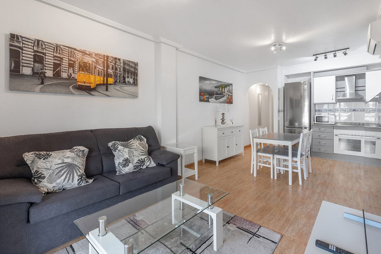 Your ideal new home, perfect for investment or for living year-round, is waiting for you!We present this charming 70 m² apartment, designed for those who value comfort, style, and a prime location. Located on the third floor with an elevator, this home is in impeccable condition and has been tastefully decorated.Layout:2 spacious bedrooms ensuring optimal rest.1 fully renovated bathroom with a modern shower tray.Open-plan kitchen with an integrated laundry-gallery, practical and functional.Bright living-dining room with access to a cozy, enclosed terrace of 15 m², perfect for enjoying year-round.Spectacular private terrace of 72 m², equipped with a flat awning, lighting, and water. The ideal space to relax in the sun or share outdoor moments with family and friends.Amenities:Climate control with cold/heat pump.Air conditioning for maximum comfort.Built-in wardrobes in all bedrooms.Communal pool to cool off on warm days.Location:Just a few minutes from the sea and surrounded by nature, this apartment is located in a peaceful area with all the services you need within reach: supermarkets, restaurants, public transport, and excellent sports facilities, including three golf courses and several paddle tennis courts nearby.Don’t miss the chance to see it! Come visit and discover your new home.