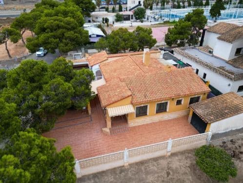 South-Facing 3 Bed-2 bath Semidetached Villa Just 400 Metres from the Beach — Prime Location & Excellent Investment OpportunityLocated in one of the most sought-after residential areas of Orihuela Costa, Punta Prima, this spacious south-facing semidetached villa offers the perfect combination of lifestyle, location, and investment potential.Situated on the beachside of the N-332 and less than 400 metres from the sea, the property enjoys easy walking access to beaches, restaurants, shops, and all essential amenities — making it ideal as a permanent residence, holiday home, or rental investment in the Costa Blanca South.Set on a generous 274m² plot, the villa offers 131m² of built area distributed entirely on one level, with the additional possibility of constructing a second floor, adding even more value and future potential.Property Highlights- 3 Bedrooms- 2 Bathrooms- 131m² Built Area- 274m² Private Plot- South Facing- Only 400m from the Beach- Private Garage + Additional Parking- Large Sunny Garden with BBQ & Pergola Area- Covered Terraces & Patio Areas- Enough space for a Swimming PoolPotential to Extend with an Additional FloorDesigned for Mediterranean LivingThis charming semidetached villa features a spacious lounge area, a self-contained fully fitted kitchen, and excellent outdoor space designed for enjoying the Mediterranean climate all year round.The large private garden includes:- BBQ and entertaining area- Built pergola for shaded outdoor dining- Sun terraces- Off-street parking- Private garage Storage and utility roomThe property also benefits from:- Air conditioning- Double glazing- Alarm system- Fitted wardrobes- White goods included- Window security locks- FurnishedExceptional LocationThe villa is ideally positioned within walking distance of:- The beach and promenade- Bars and restaurants- Shops and supermarkets- Public transport- Coastal walking areasThe nearby beach also benefits from lift access, making it particularly convenient for families and residents of all ages.Golf lovers will appreciate the proximity to several renowned golf courses, located just a short drive away.Distances- Beach: 400 metres- Amenities: 50 metres- Golf Courses: 6 km- Alicante Airport: 48 kmAn Excellent Investment OpportunityProperties in this part of Orihuela Costa are increasingly difficult to find, especially semidetached villas within walking distance to the beach and with future extension potential.Whether you are searching for:- a permanent home in Spain,- a holiday property,- or a high-demand rental investment,This semidetached villa represents a fantastic opportunity in one of the Costa Blanca’s most desirable coastal areas.
