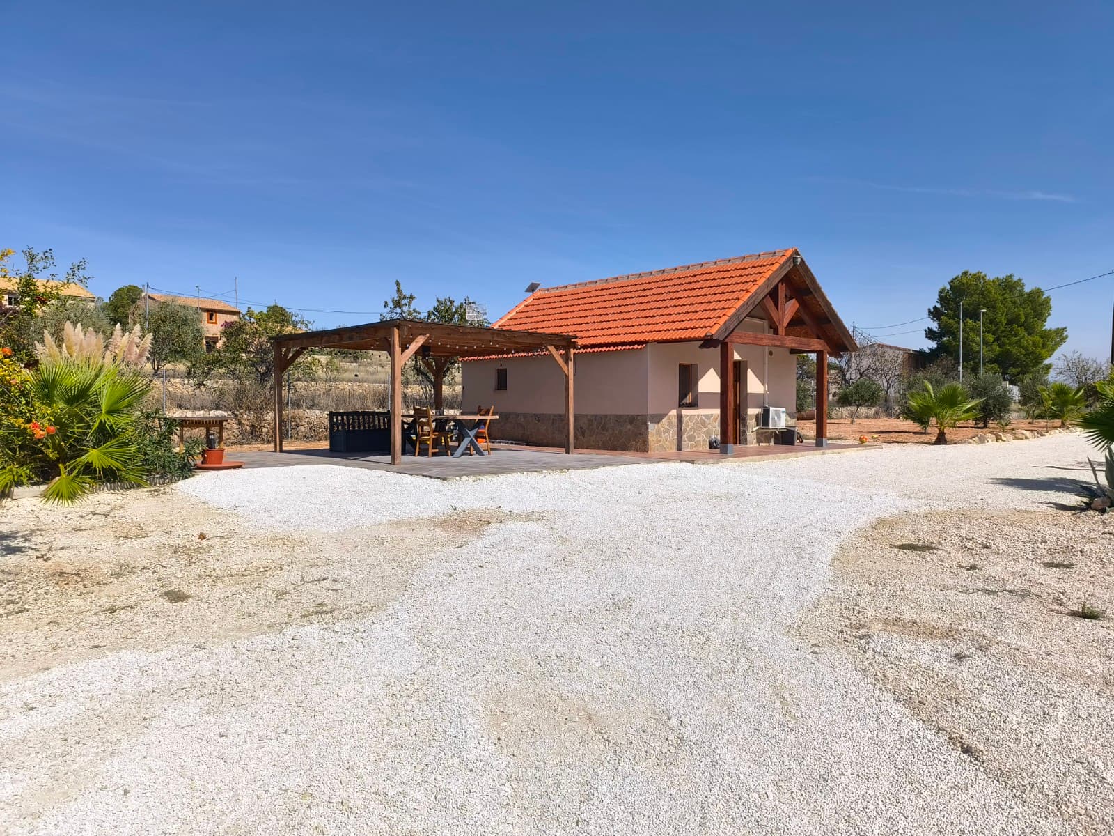 Chalet for Sale near PinosoDiscover this charming Spanish chalet, located just 15 minutes from the vibrant town of Pinoso. The property offers beautiful open views of the surrounding countryside, perfect for those who appreciate peace and nature. Ideal for those looking for a place to stay during their vacation and enjoy the beauty and tranquillity of the Spanish countryside. As well as place to start your every day living in Spain.The house features a spacious covered porch, ideal for enjoying the Mediterranean lifestyle throughout the year. Set on a generous plot of 7,000 m², half of which is securely fenced, it provides plenty of privacy and space for a garden, orchard, or even a pool. One of the key advantages of this property is the possibility to extend the house, allowing you to create your dream home tailored to your needs.If you are looking for a property with great potential in a tranquil setting, yet close to all amenities, this chalet is an excellent opportunity.About Monóvar & Pinoso – Where Tradition Meets FlavorSavor the rich taste of Fondillón, Monóvar's world-famous sweet wine, and indulge in rustic Mediterranean dishes like gazpacho manchego, rabbit with snails, and migas. Explore charming historic streets, lace-making traditions, and nearby natural parks. In neighboring Pinoso, experience award-winning red wines, marble heritage, and warm village hospitality. Together, these towns offer the perfect blend of culture, cuisine, and countryside charm.