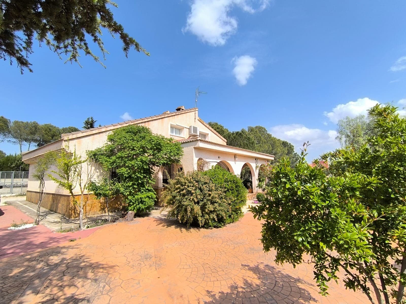 Discover this stunning family villa, completely reformed recently. With 360 m² built over 2 floors, this beautiful villa is set on a plot of 5,000 m², of which 3000 m2 are fenced. All in a tranquil neighbourhood, just 2 km from Yecla. The house is finished with a quality materials and ready to move in.Designed for comfort and space, this two-story property is perfect for families or those seeking a comfortable, peaceful retreat. The ground floor features 3 bright bedrooms, a full bathroom, and an open-plan living room with kitchen, complemented by electric radiators. Upstairs, you'll find 2 additional bedrooms, a second living room, a bathroom, and a little office room/changing room, ideal for added privacy or guest space.Outside, enjoy a private swimming pool with filtration system, a barbecue area, and plenty of room to relax, garden, or entertain. The property also includes a large carport, a 30 m² enclosed garage, and an additional 20 m² garage space, ideal for a workshop, storage, or a further conversion.With air conditioning, ample outdoor space, and essential utilities nearby, this home combines comfort of modern living with tranqullity of the countryside.About the area: Yecla is a charming and historic town of app. 35000 inhabitants, located in the region of Murcia. It is renowned for its award-winning wines, historical landmarks, and vibrant local culture. The surrounding natural landscapes of scenic mountains, vineyards and almond groves provide opportunities for outdoor activities, while the town itself offers all necessary services, including hospital, schools, shops, restaurants, and other services. With a friendly local community, lively markets, excellent gastronomy, and easy access to nature, Yecla is an ideal location for those seeking authentic Spanish lifestyle - just about an hour from the coast and Alicante airport.About us: We have a large portfolio of properties in the Costa Blanca and Costa Calida areas, specialising in country properties, villas, fincas, building plots and design and build options in the Alicante and Murcia regions with a particular emphasis on Yecla, Novelda, Elda, Monovar, Pinoso, Sax, Villena, Aspe, Fortuna, Jumilla, Abanilla, and many more surrounding areas. We have been established since 2004 and have decades of experience between the team which we bring to bear to help you find and secure your new dream home. We help you every step of the way to make sure your purchase in Spain is safe and hassle free. We are not here to sell you a property, we are here to help you realise your dream and find what is right for you. With us you are in the safest hands. Contact us now to have a no obligation chat about how you too can realise your dreams.