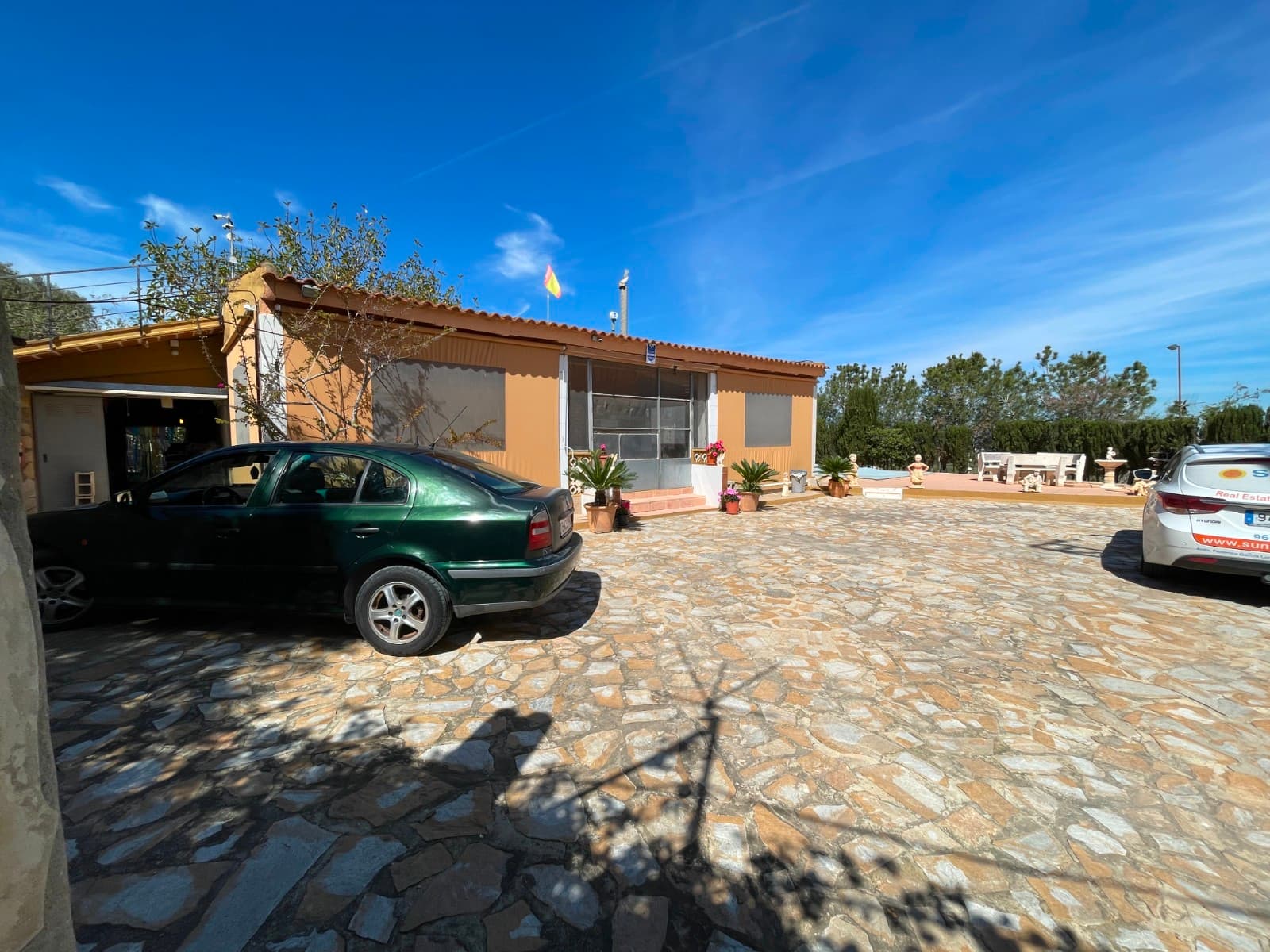Discover your perfect retreat on the Costa Blanca. This unique property is located in the charming town of Rojales, just 3 km from the most beautiful beaches in the region. Set in one of the most exclusive and privileged areas of the coast, the property sits on a stunning plot of over 10000 m², offering breathtaking panoramic views due to its elevated position.With its private swimming pool and beautiful fruit trees, this is a true natural paradise. Imagine enjoying such a peaceful and scenic environment, yet being only minutes from the beach. Here, you can enjoy both privacy and serenity, while being under 3 km from all essential services.The property offers security and peace of mind thanks to its location in a gated community, surrounded by neighbors, ensuring a safe and welcoming environment. The feeling of being in the heart of nature, surrounded by mountains and valleys, is unparalleled, yet with the convenience of the coast being so close.The House:Upon entering, you are welcomed by a porch of more than 59 m², a perfect space that could be enclosed with PVC windows to create a larger living area. The house features three spacious bedrooms, a functional kitchen, and a bathroom with a shower. While the house is in good general condition, it offers great potential for updates such as the windows and kitchen, allowing you to customize it to your taste.A 40 m² storage room is located next to the house, offering the opportunity to expand the property further.Just in front of the house, you will find a private swimming pool of 28 m², a wooden shed, an additional bathroom with a shower, a barbecue, and an oven, perfect for enjoying outdoor meals with family and friends. Additionally, the property has space to park up to 3 cars, all under shade for maximum comfort.Exclusive access with two gates: one electric gate at the main entrance and another private gate giving you direct access to the property with your car.This home is special not only because of its design but also its privileged location. With stunning views towards the mountains of Crevillente and the coast, it is the perfect place for those seeking a unique home surrounded by nature but with easy access to the sea.Don't miss out on this unique opportunity! Call us now and start imagining your life in paradise on the Costa Blanca.