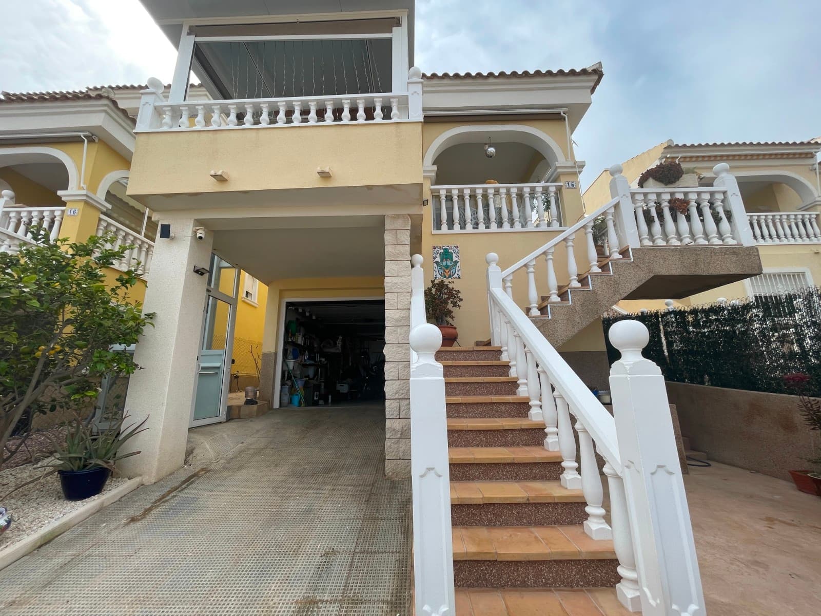 Located in one of the most sought-after areas of La Marina, this stunning detached villa with a guest house offers beautiful sea views in Guardamar del Segura — a setting that perfectly combines tranquility with close proximity to all amenities, restaurants, and shops.The property stands out for its versatility and well-designed layout across two floors. The ground floor features a fully equipped guest apartment, ideal for hosting visitors in complete privacy or as a rental opportunity.On the main floor, the home impresses with its brightness and spacious feel. An elegant open-plan living and dining area with a modern kitchen creates a warm and inviting space, with direct access to a large terrace where you can enjoy the Mediterranean climate and sea views. A private lift connects both levels, adding extra comfort and accessibility.At the top, a spectacular rooftop solarium takes this property to the next level. Equipped with a pergola, summer kitchen, and jacuzzi, it is the perfect space to relax, entertain, and enjoy the views.The villa also includes solar panels, promoting energy efficiency and a sustainable lifestyle. For year-round comfort, it features air conditioning (hot/cold) and a pellet stove.Outside, you will find a low-maintenance garden, private parking, and access to a communal swimming pool.A unique opportunity, whether as a permanent residence, holiday home, or investment with great potential.Interested? We would be delighted to show you this property in person.