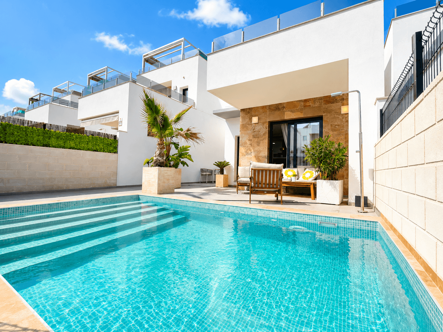 This stunning villa is in perfect condition and offers a contemporary design that prioritizes comfort and style. The open-concept living and dining area, along with a modern kitchen, creates a welcoming space that's ideal for both everyday living and entertaining guests.On the ground floor, you'll find a spacious bedroom with built-in wardrobes, accompanied by a full bathroom for added convenience. Upstairs, a charming landing leads out to a small terrace, an ideal spot to enjoy your morning coffee or relax in peace.The second bedroom is generously sized and comes with its own elegant en-suite bathroom. At the end of the hallway, the master bedroom provides a luxurious retreat, complete with an en-suite bathroom and direct access to a private terrace. This sun-filled space is perfect for unwinding and soaking up the beautiful Mediterranean climate.The villa is equipped with air conditioning and is move-in ready, ensuring you can enjoy comfort and quality from day one.Nestled in the heart of the Costa Blanca, Benijófar is a charming and well-connected town in the province of Alicante. With its laid-back Mediterranean atmosphere, Benijófar strikes the perfect balance between traditional Spanish character and modern amenities. Just a short drive from the stunning beaches of Guardamar and Torrevieja, and with all essential services—such as supermarkets, restaurants, cafés, and pharmacies—within walking distance, it's an ideal destination for both year-round living and holiday getaways.