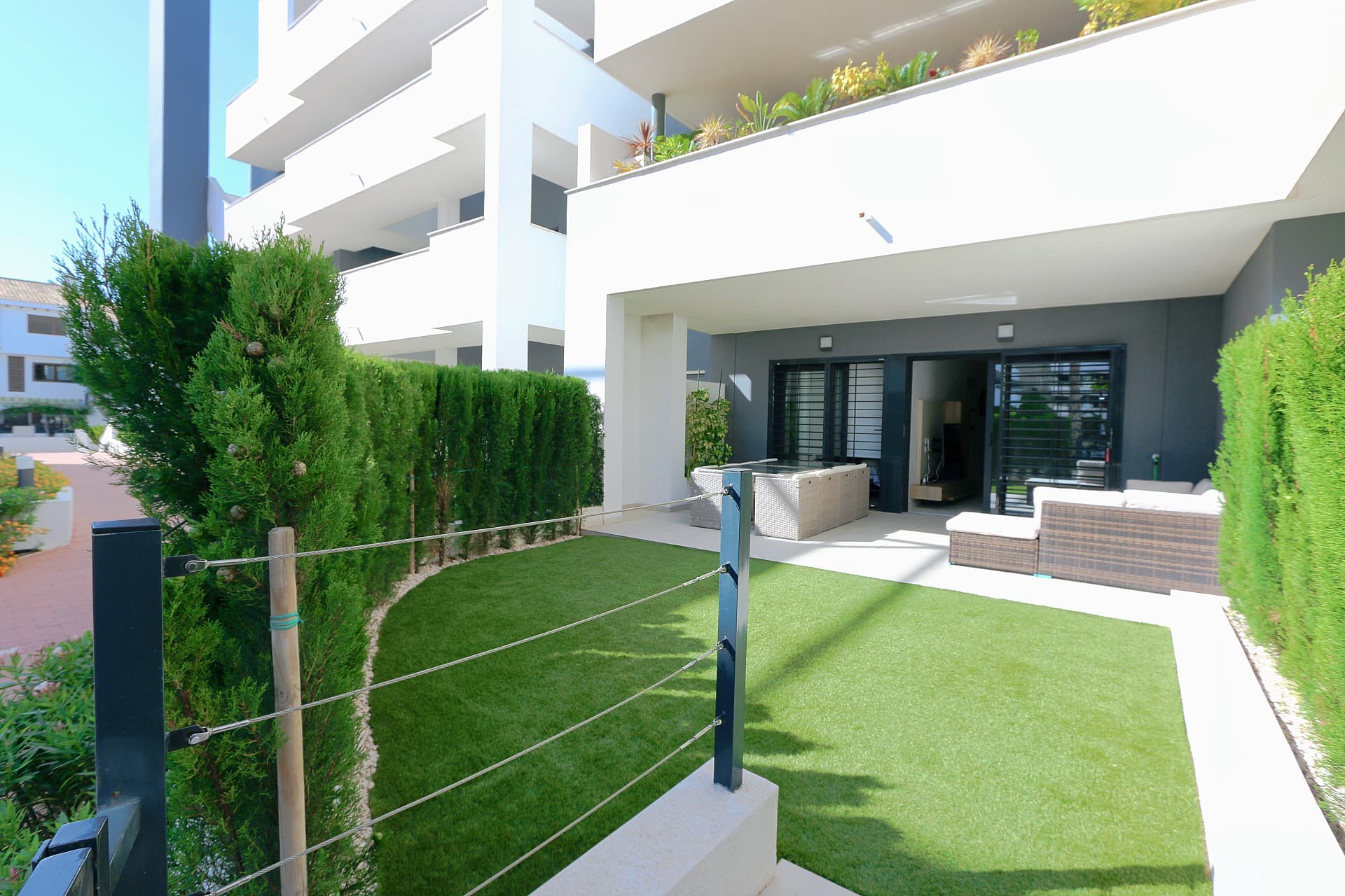 Flamenca Village Resort ground floor with parking inside. Beautiful Ground Floor Apartment in Flamenca Village Resort – Playa FlamencaExperience luxury, comfort and an unbeatable location in this stunning ground floor apartment situated in Phase 3 of the exclusive Flamenca Village Resort. The property offers 2 bedrooms, 2 bathrooms, comes fully furnished, and includes a spacious private parking space in the underground garage.The apartment features a generous private garden with open views overlooking the swimming pool, creating the perfect setting to enjoy the Mediterranean lifestyle. Within walking distance you will find the beach, the renowned shopping centre La Zenia Boulevard, and the popular weekly market. A Mercadona supermarket is conveniently located right next to the resort.Residents enjoy access to exceptional on-site facilities, including four swimming pools, a fully equipped gym, a sauna, and a welcoming pool bar.Whether you are looking for a holiday home, a permanent residence, or a smart investment opportunity on the Costa Blanca, this beautiful apartment offers everything you need to enjoy the very best of life in Playa Flamenca. ☀️